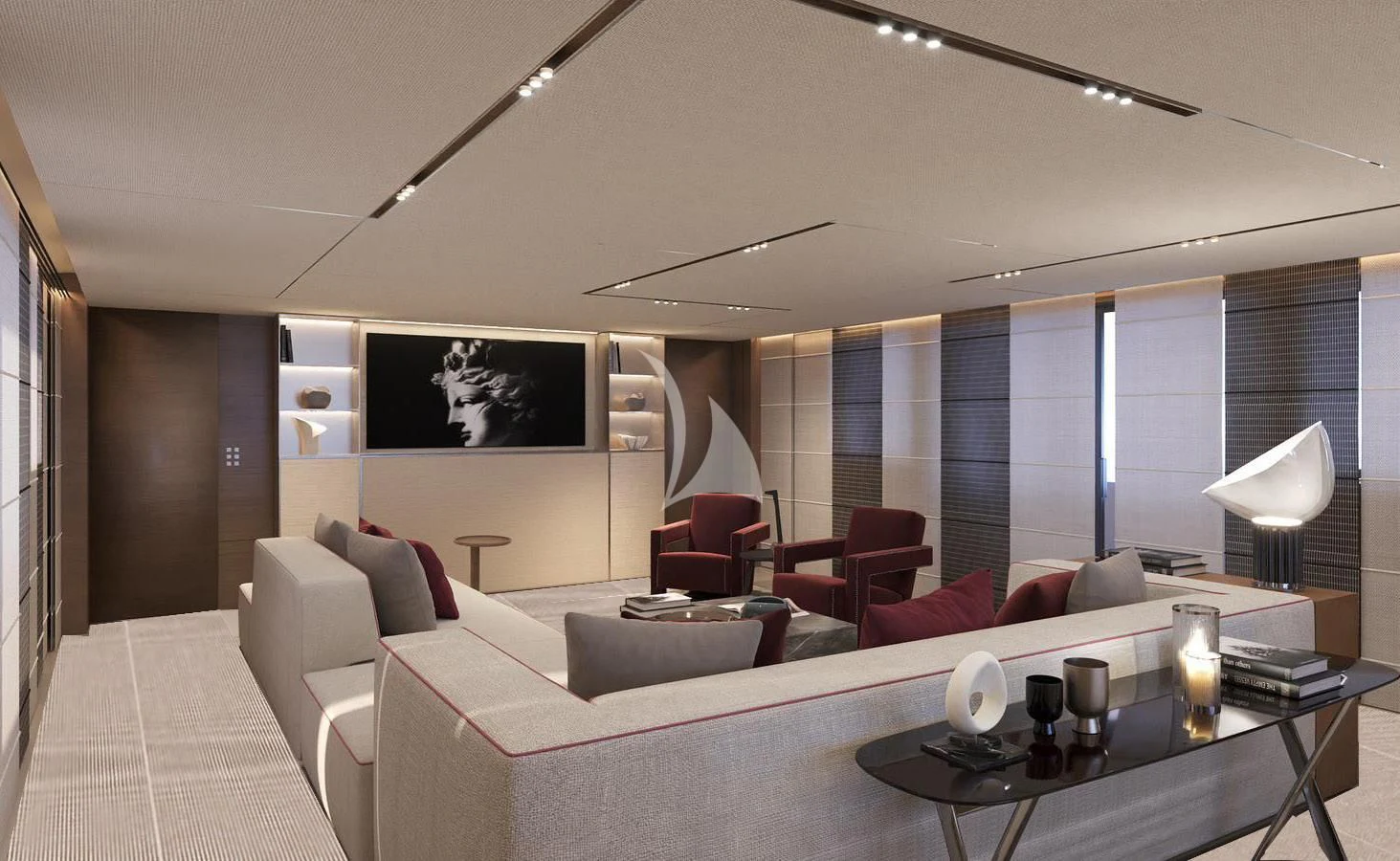 a living room with a large white sofa and a large window aboard NAIA Yacht for Sale