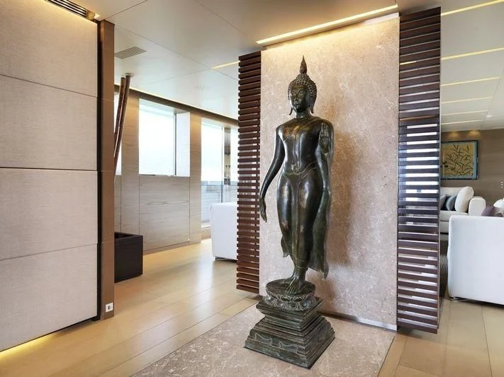 a statue in a room aboard NAIA Yacht for Sale