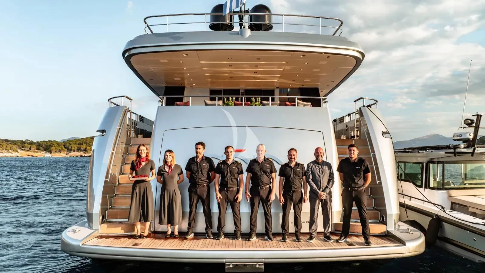 a group of people on a boat aboard NAIA Yacht for Sale