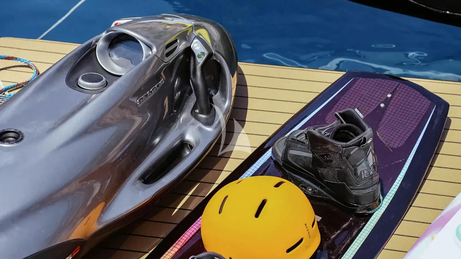 a close-up of a yellow toy car aboard NAIA Yacht for Sale