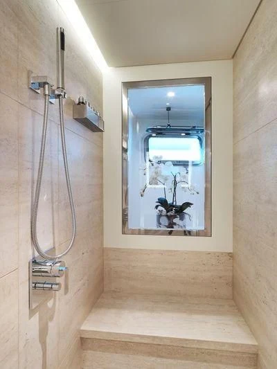 a door with a glass frame aboard NAIA Yacht for Sale