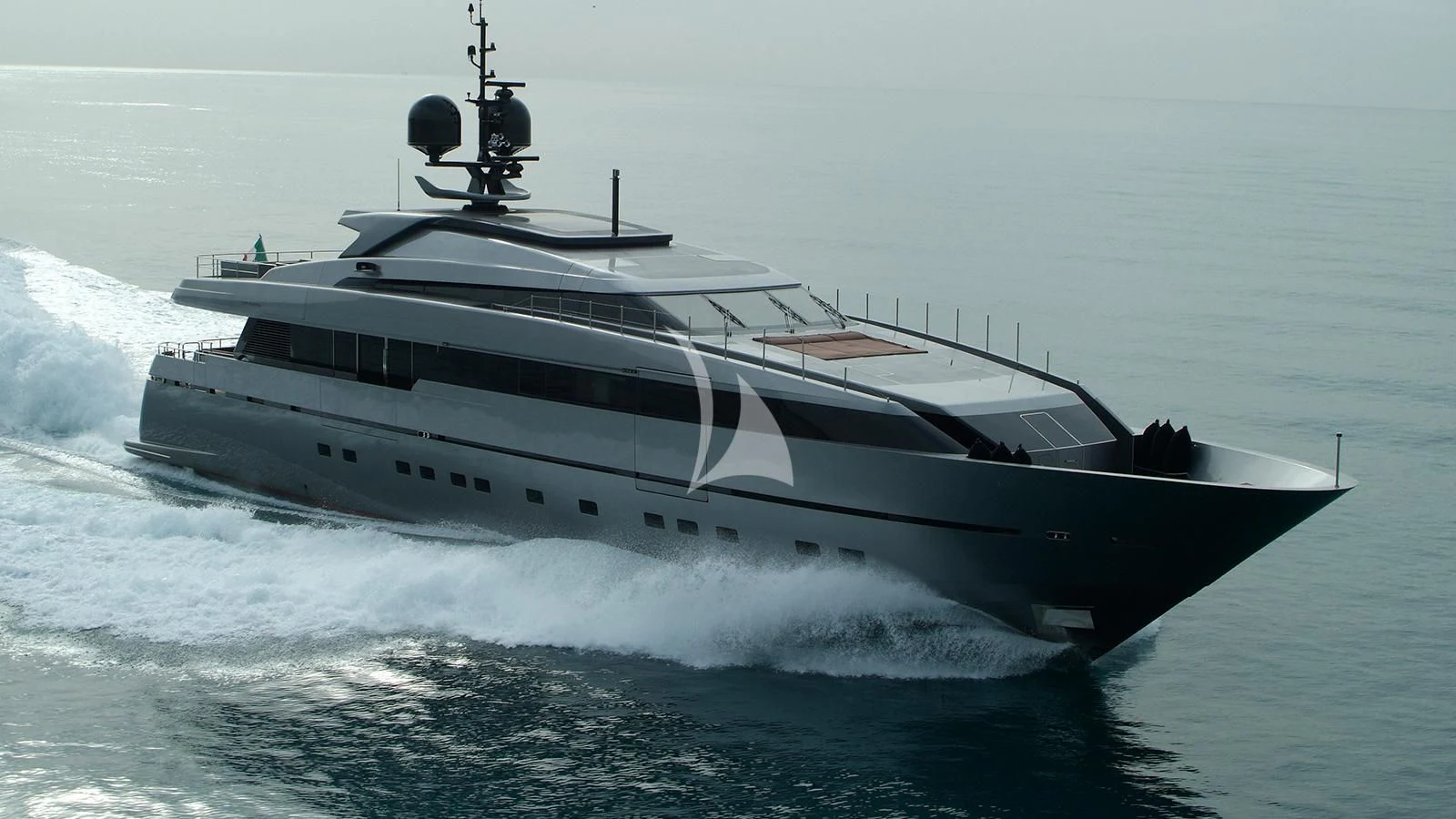 a white yacht on the water aboard NAIA Yacht for Sale