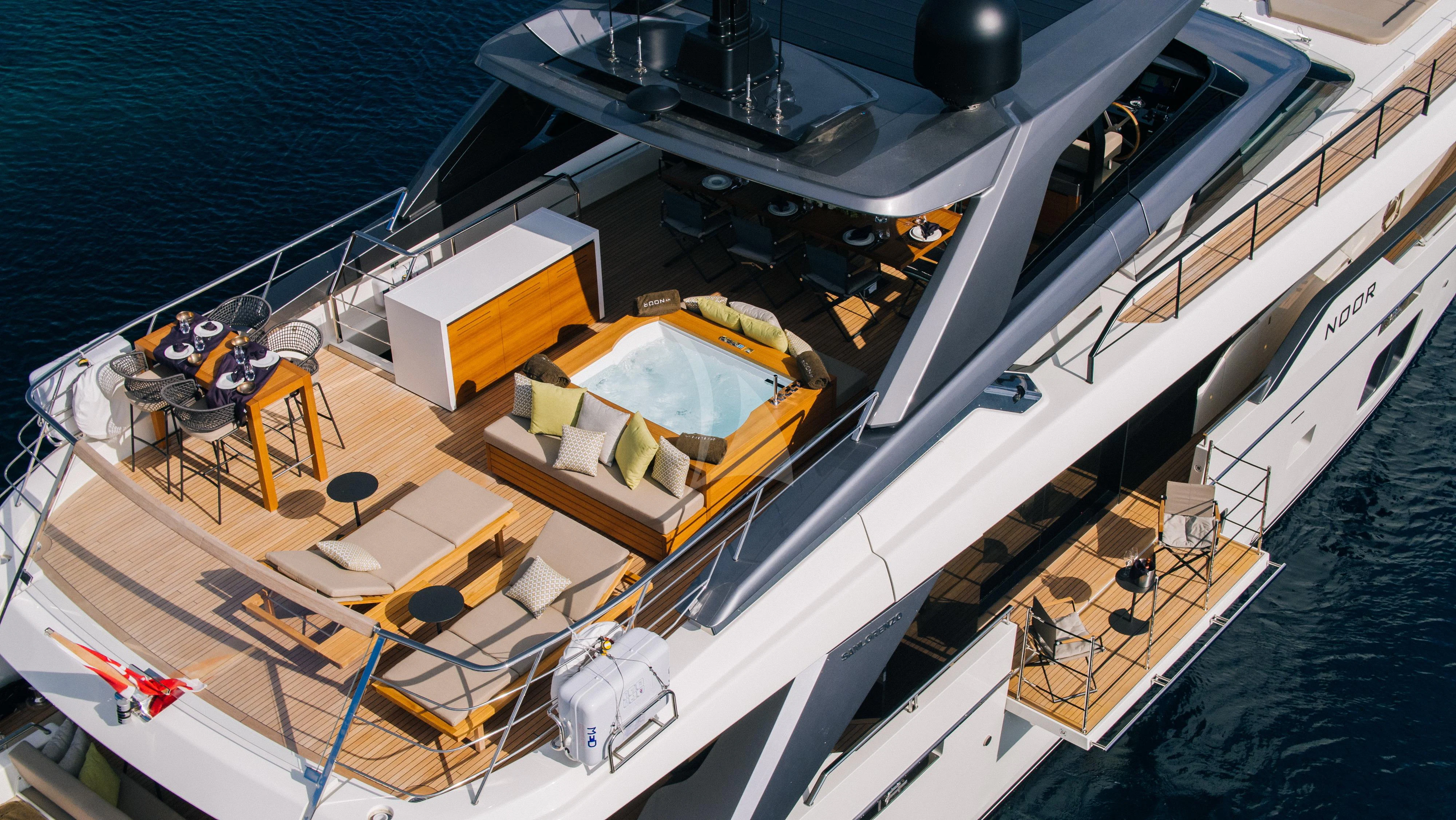 a large ship on the water aboard NOOR II Yacht for Charter