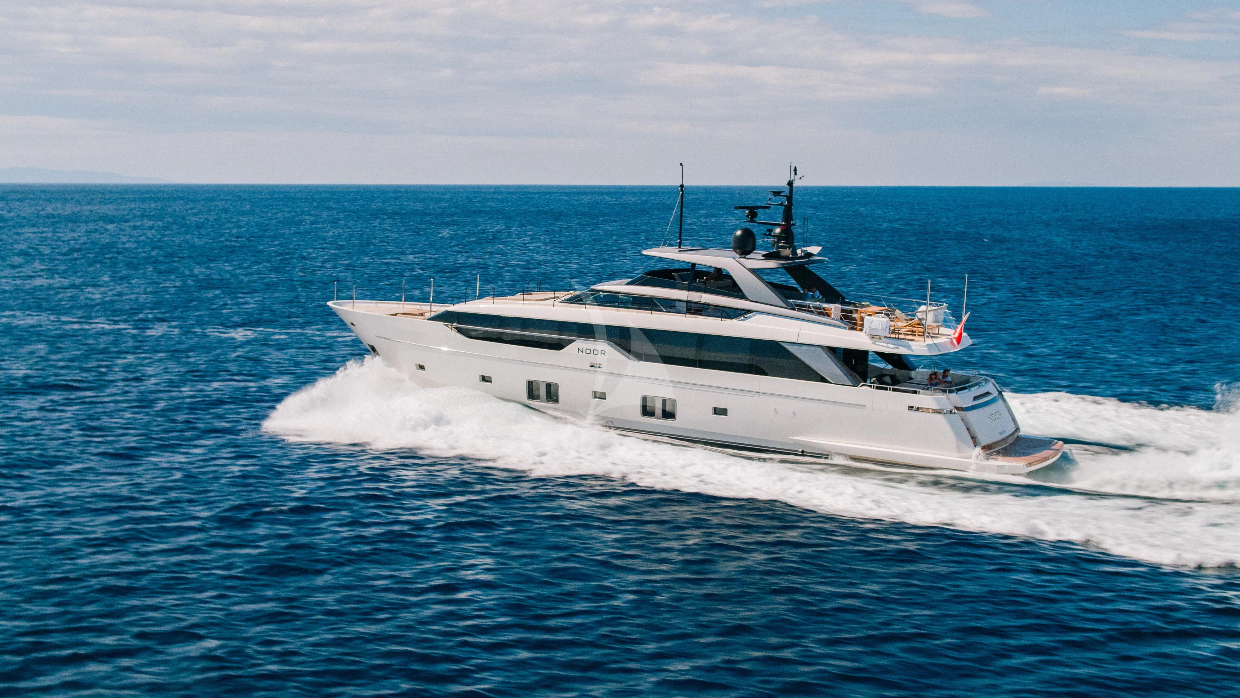 a white yacht in the water aboard NOOR II Yacht for Charter