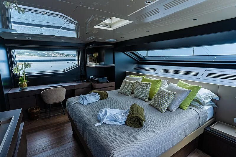 a bed in a room aboard NOOR II Yacht for Charter