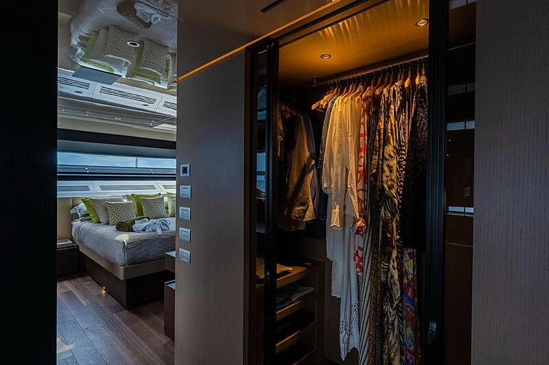 a bedroom with a closet aboard NOOR II Yacht for Charter