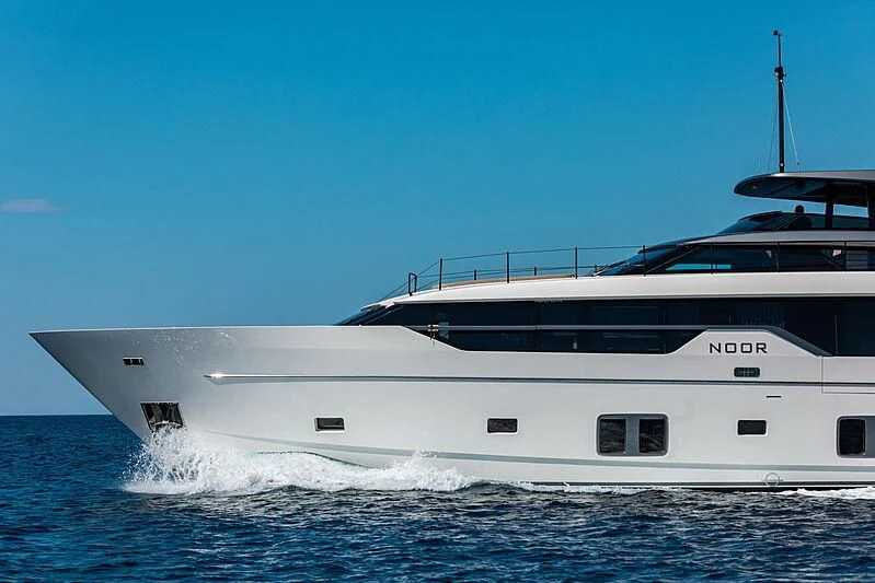 a white yacht in the water aboard NOOR II Yacht for Charter