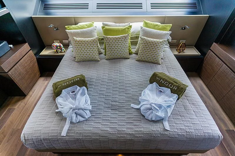 a table with a group of wrapped presents on it aboard NOOR II Yacht for Charter