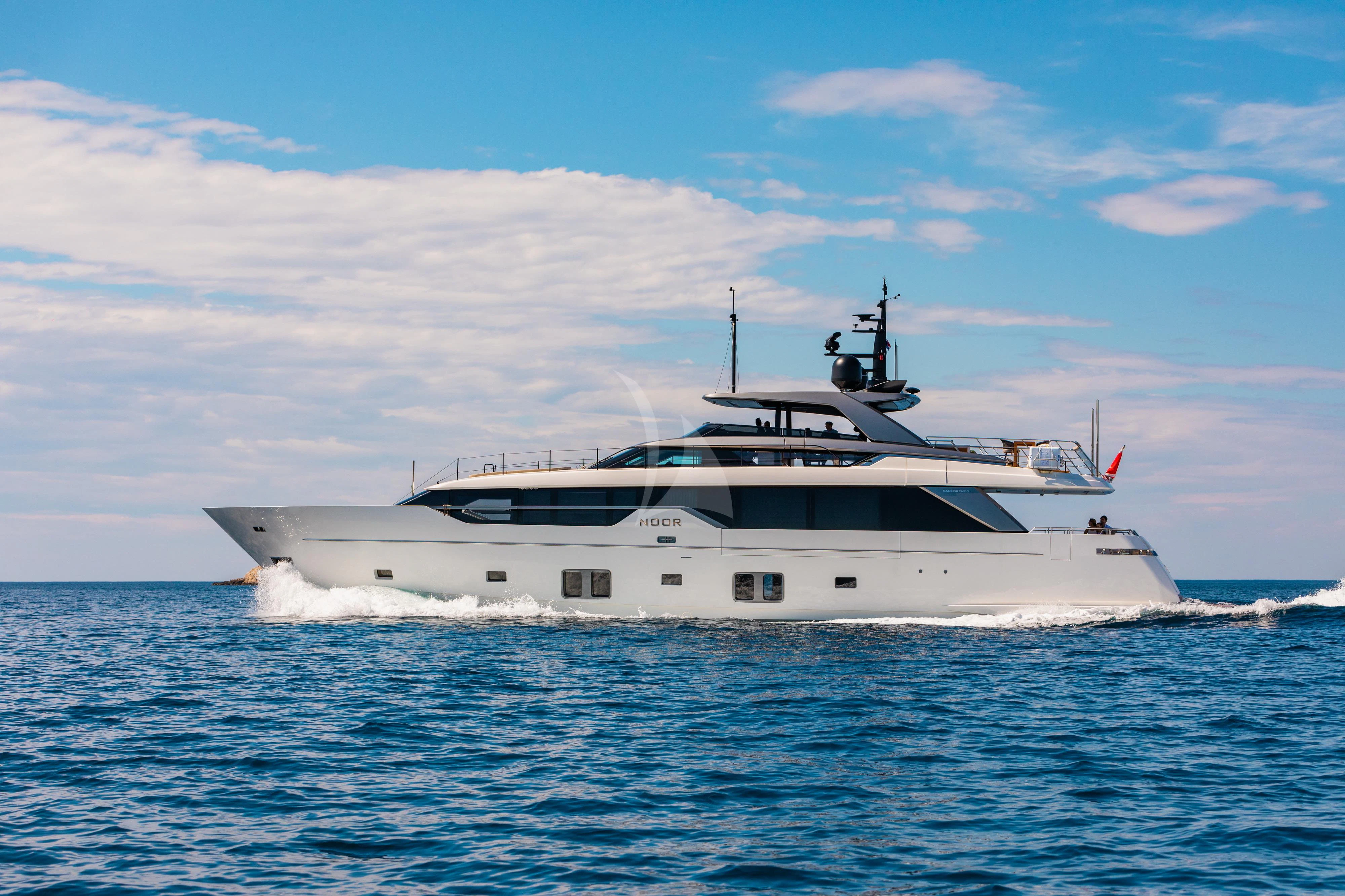 a white yacht in the water aboard NOOR II Yacht for Charter