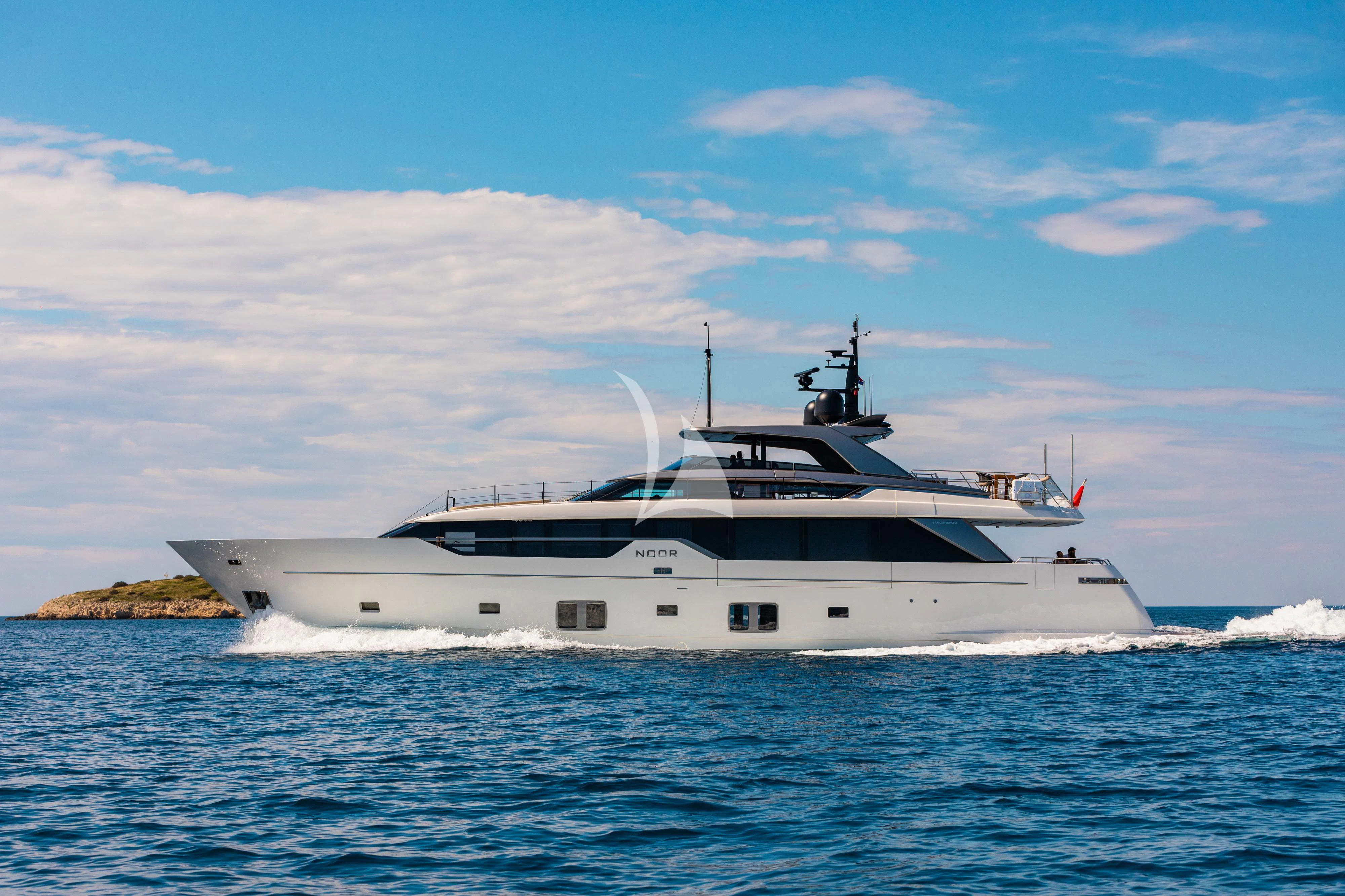 a white yacht in the water aboard NOOR II Yacht for Charter