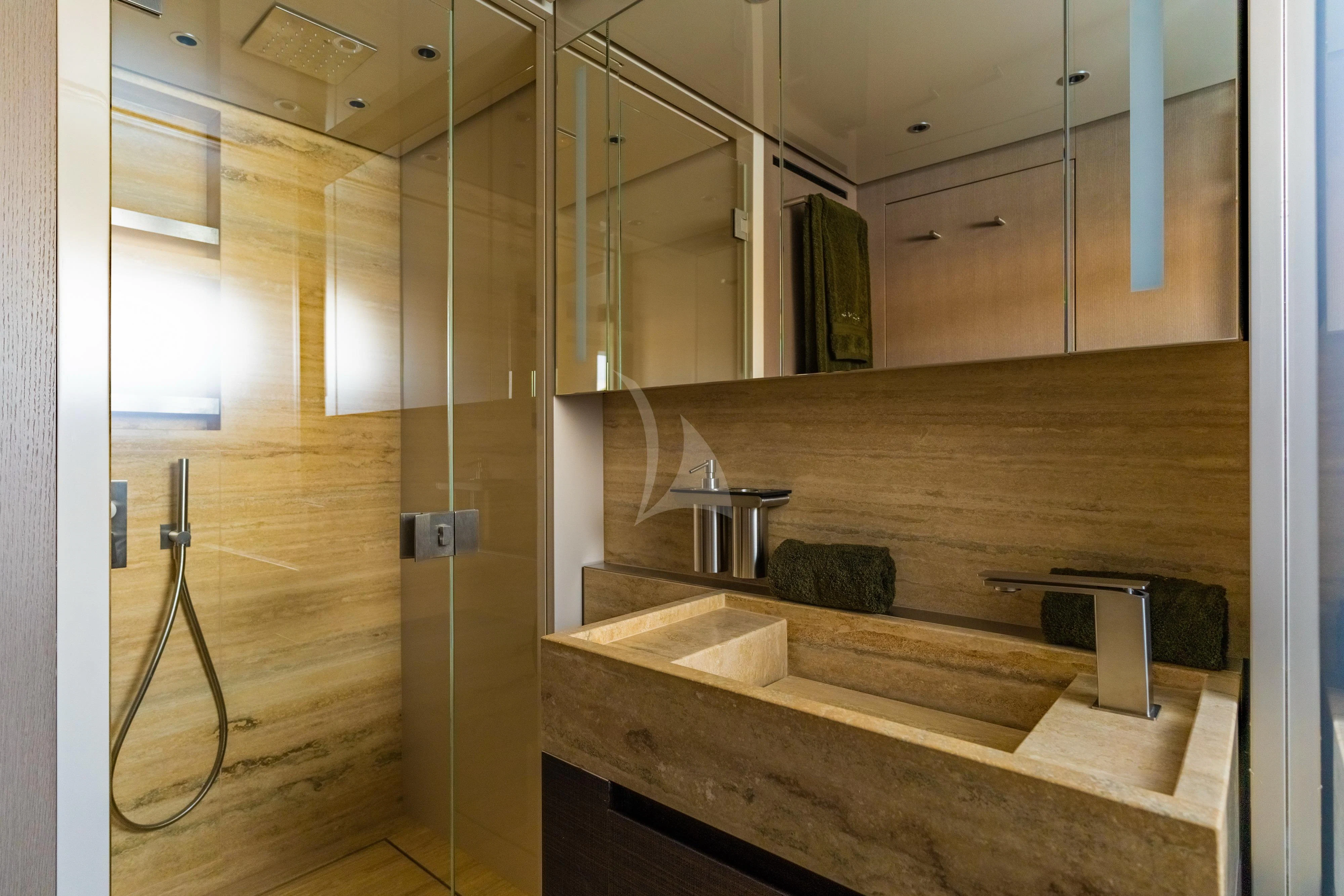 a bathroom with a wood floor aboard NOOR II Yacht for Charter