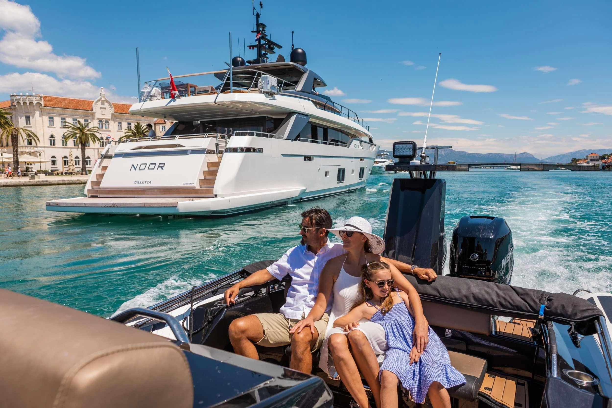 a group of people on a boat aboard NOOR II Yacht for Charter