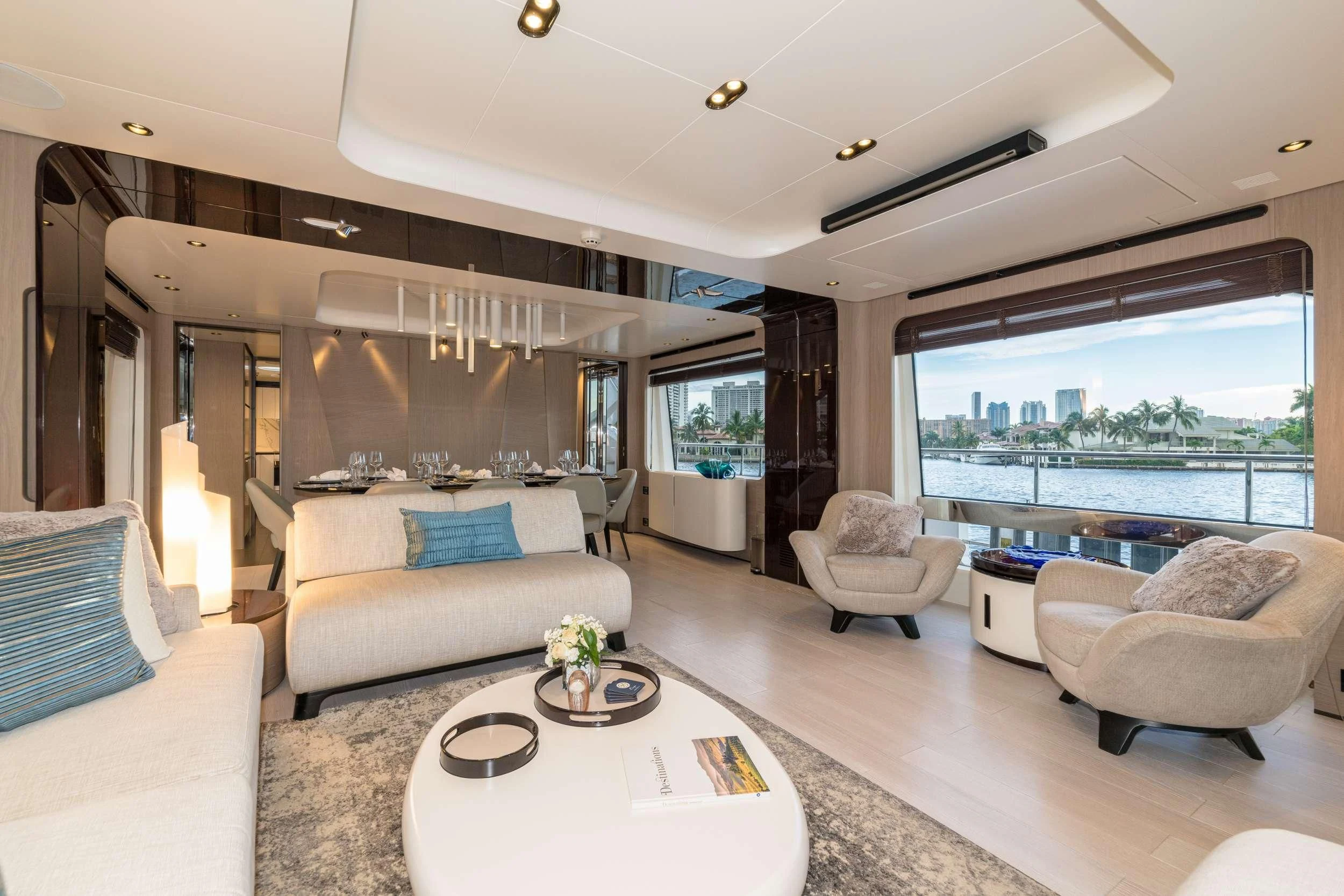 a living room with a large window aboard MAJESTIC MOMENTS Yacht for Sale