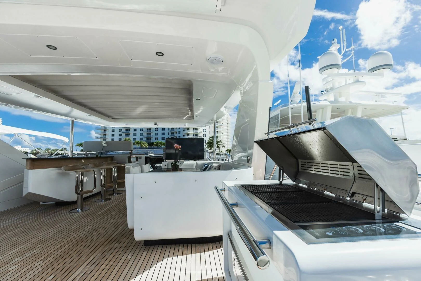 a large room with a large white boat and a large open window aboard MAJESTIC MOMENTS Yacht for Sale