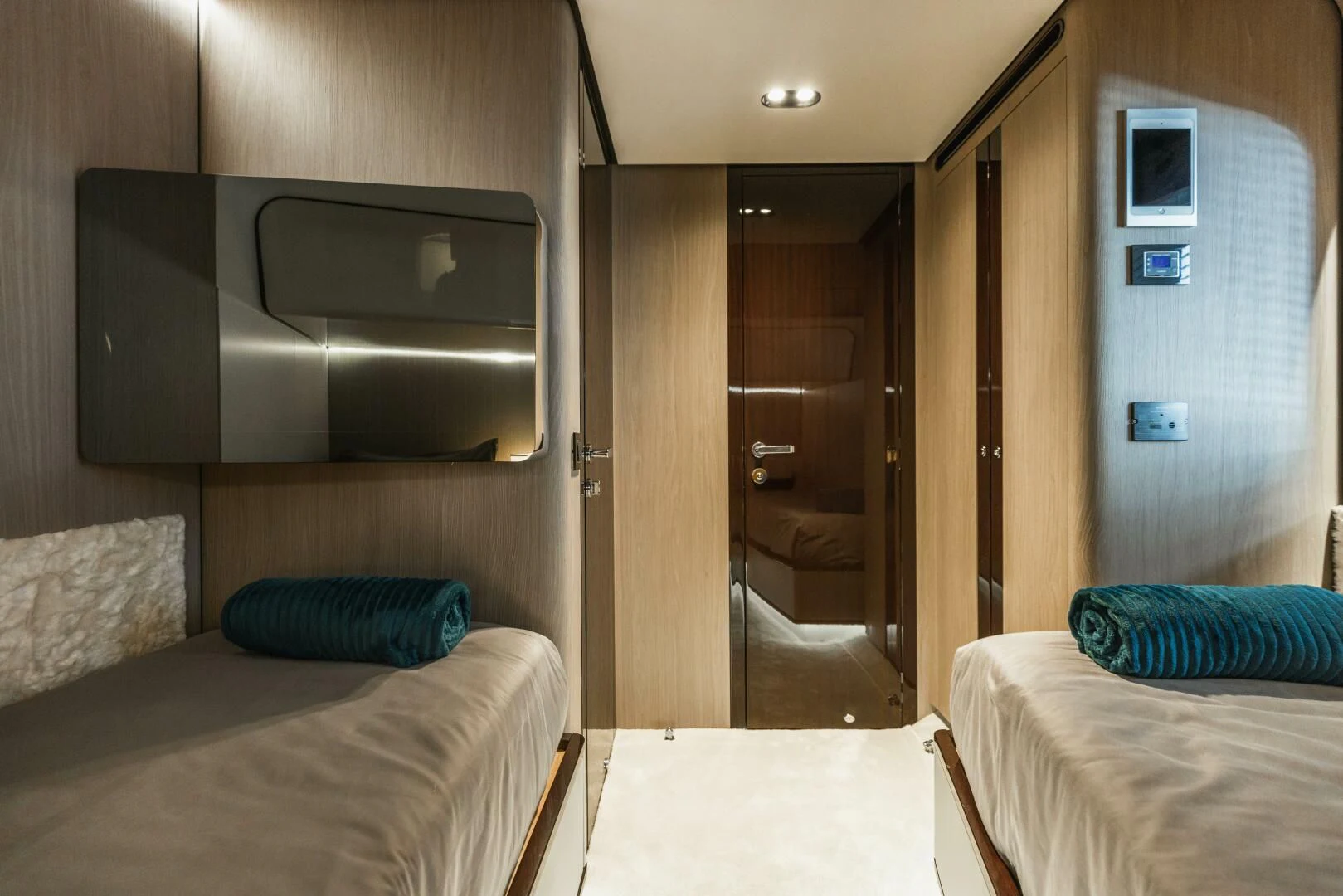 a room with a bed and a television aboard MAJESTIC MOMENTS Yacht for Sale