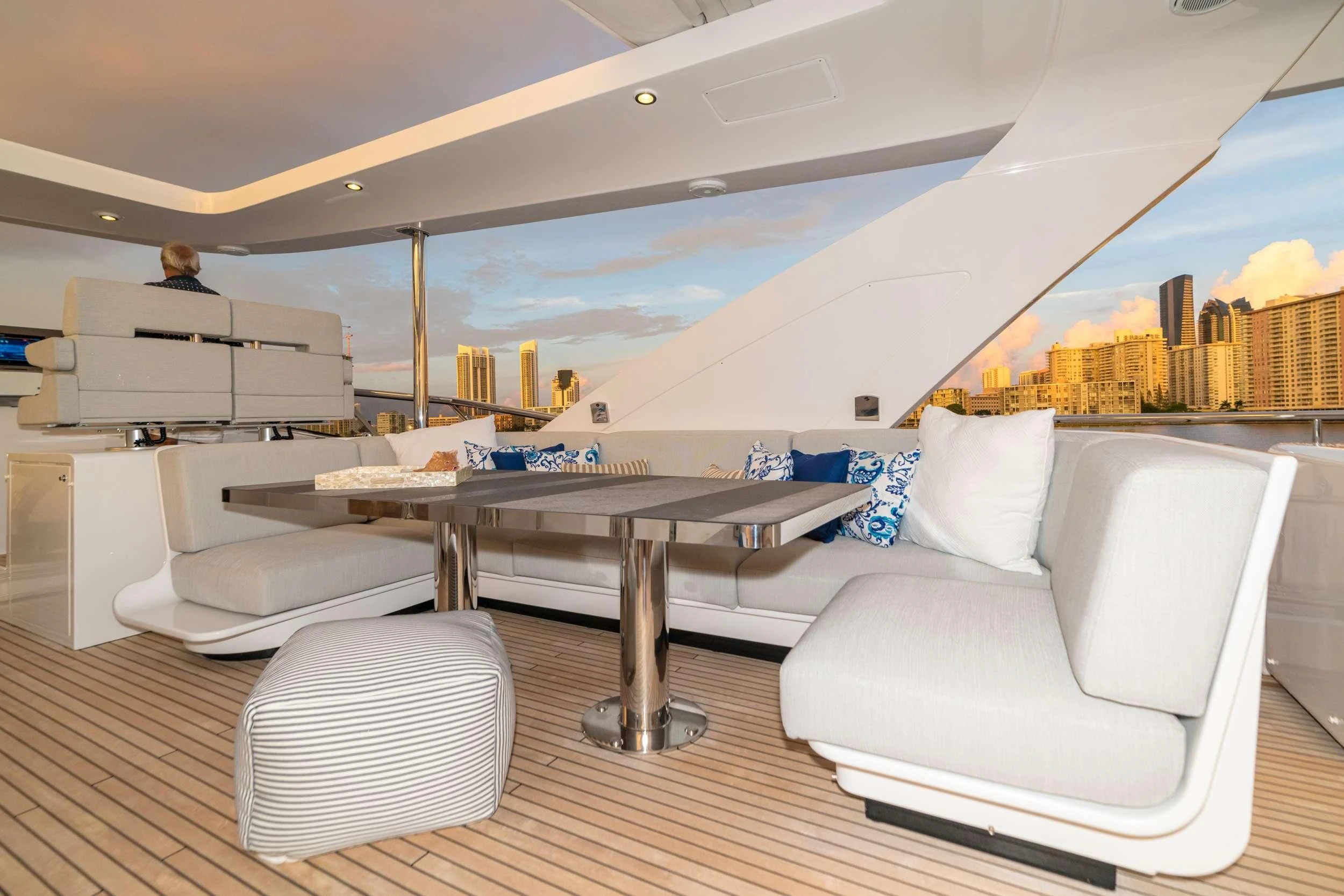 a room with a couch and a table aboard MAJESTIC MOMENTS Yacht for Sale