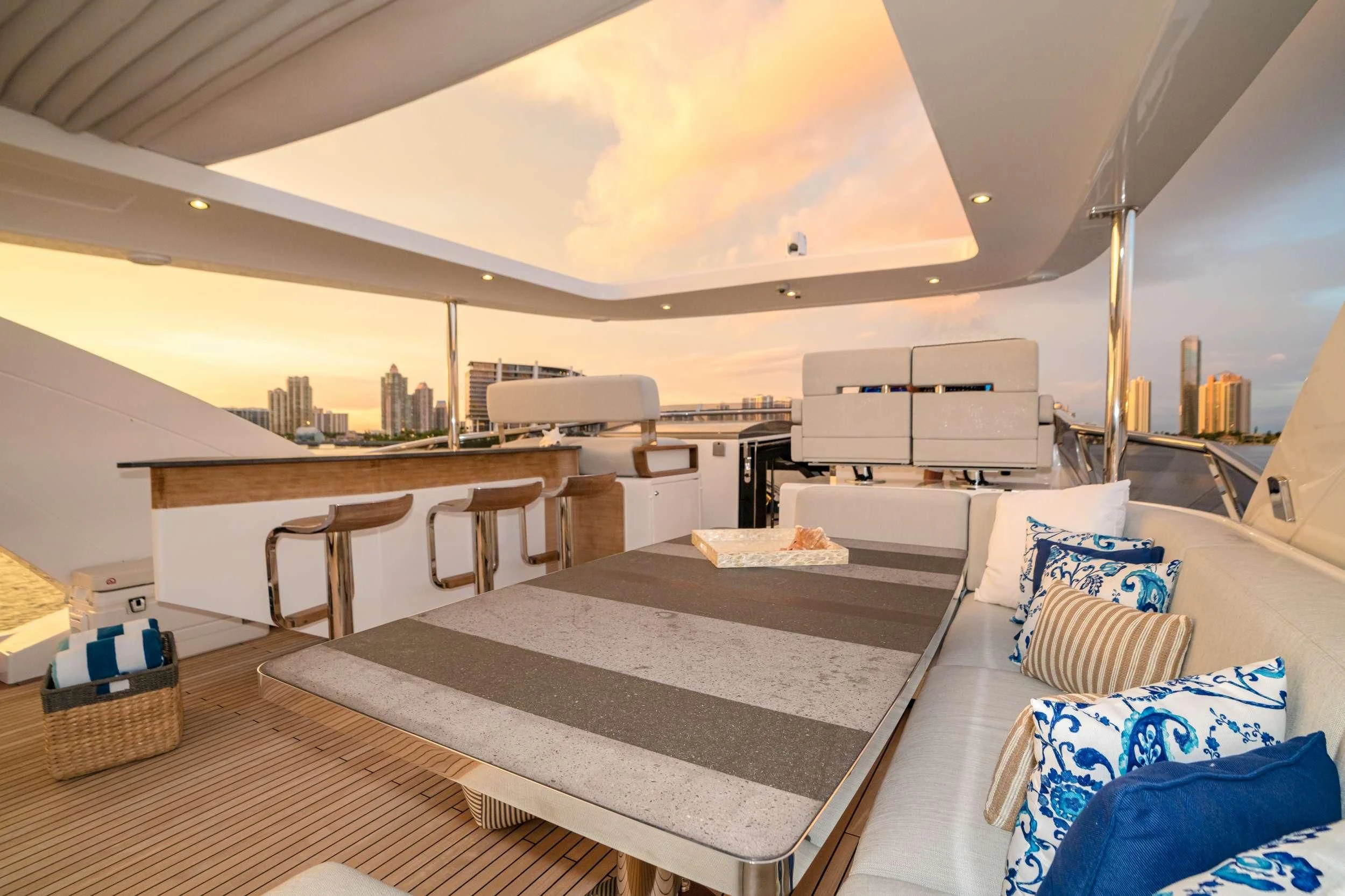 a room with a bed and a table aboard MAJESTIC MOMENTS Yacht for Sale
