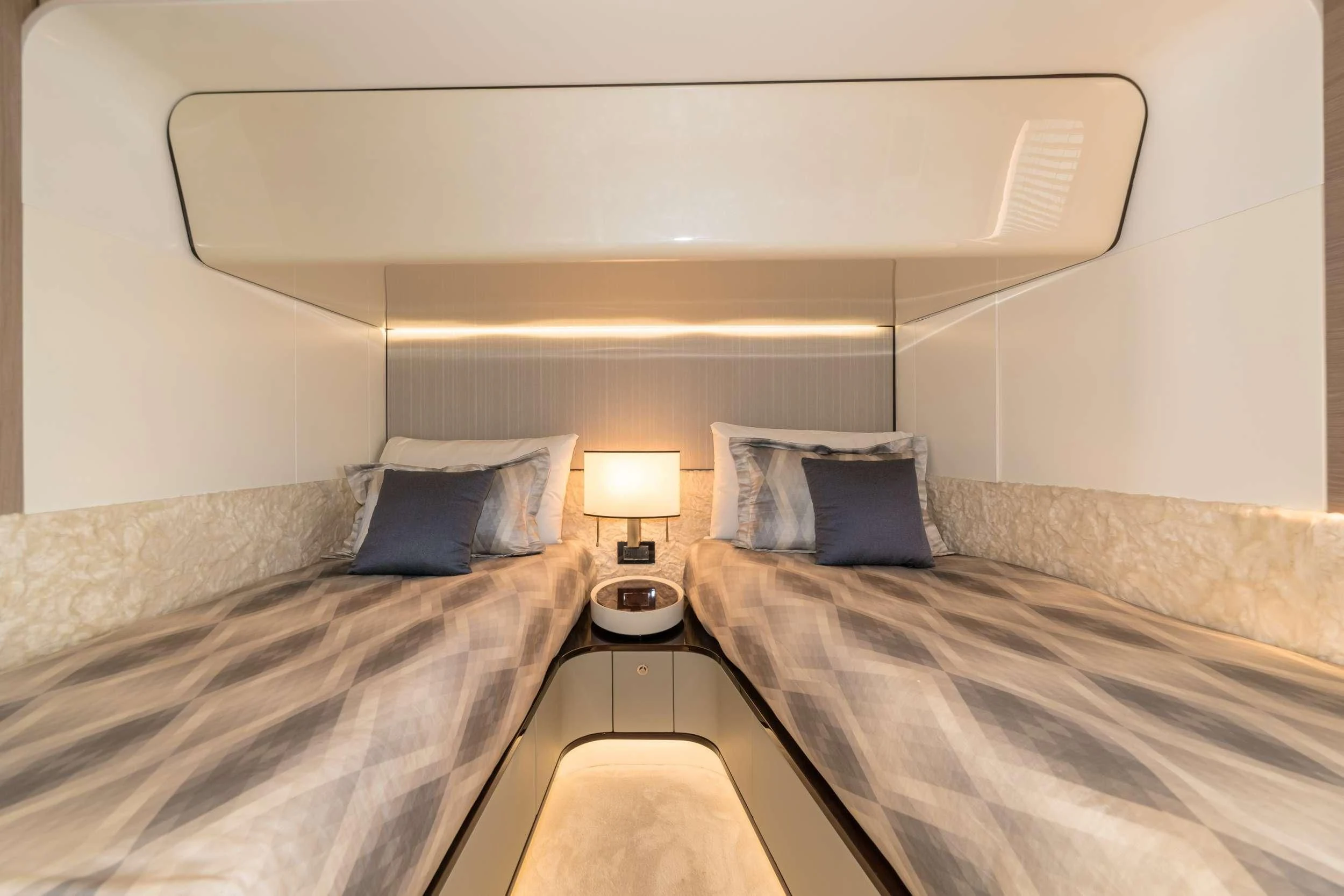 a couple of beds in a room aboard MAJESTIC MOMENTS Yacht for Sale