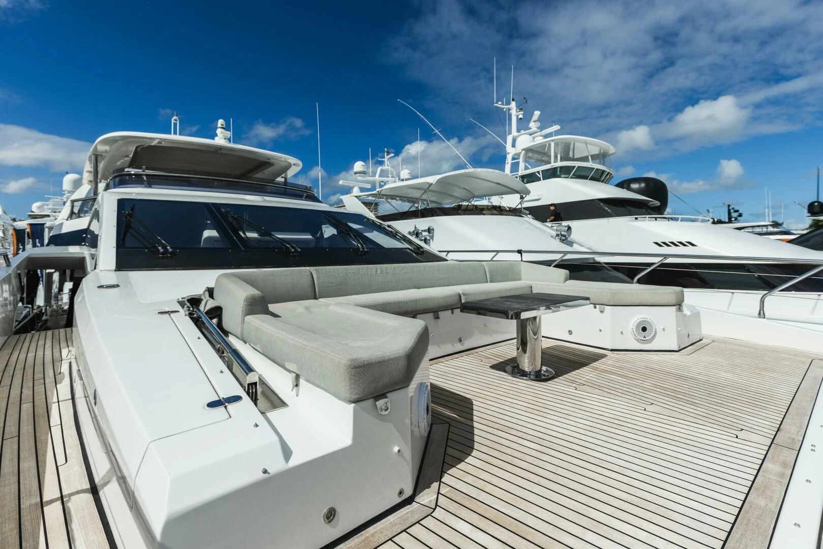 a white car parked on a dock aboard MAJESTIC MOMENTS Yacht for Sale