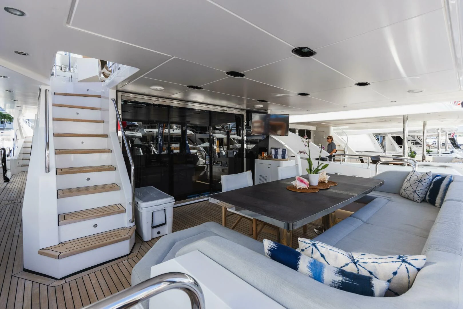 a room with a couch and a table aboard MAJESTIC MOMENTS Yacht for Sale