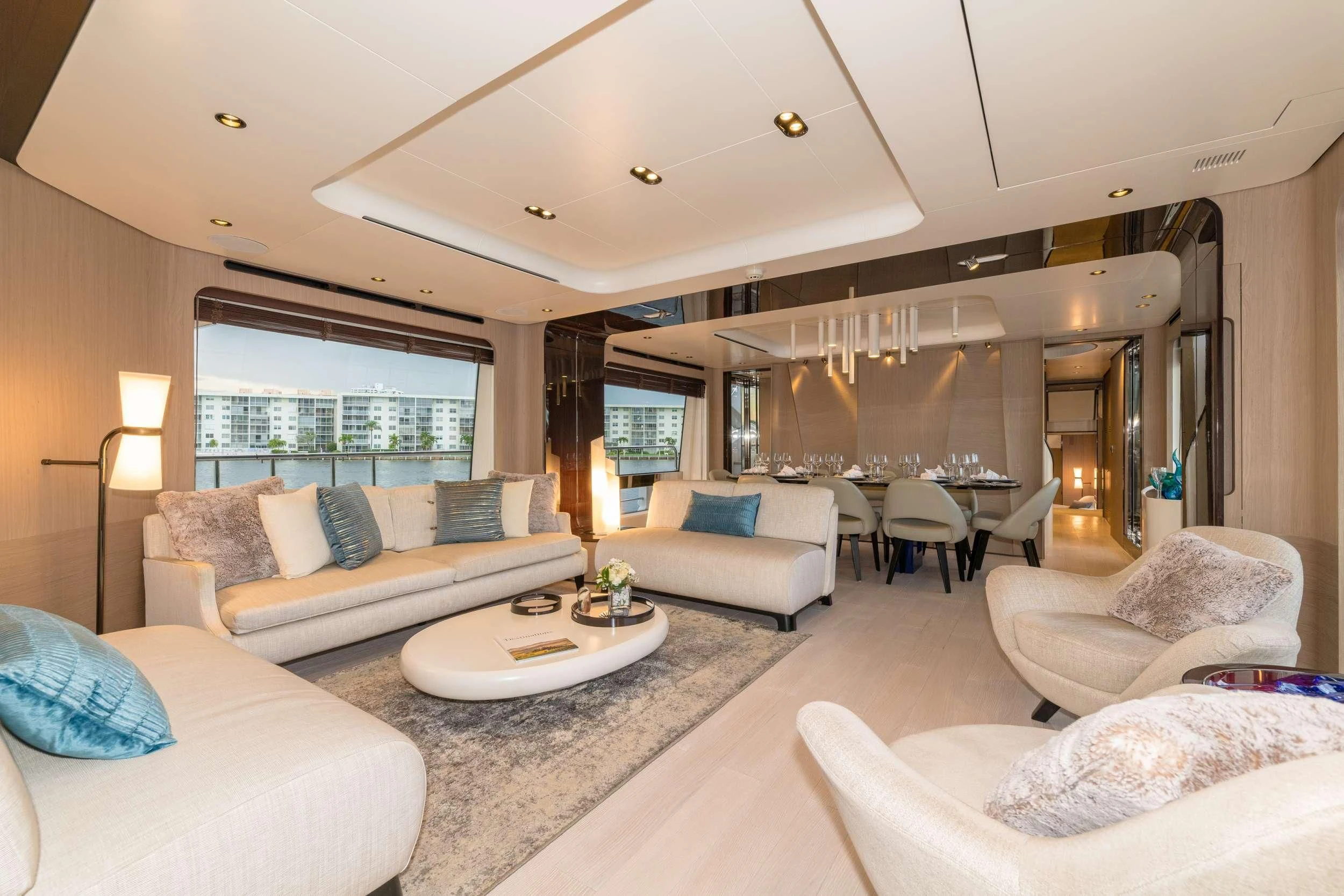 a living room with a large window aboard MAJESTIC MOMENTS Yacht for Sale