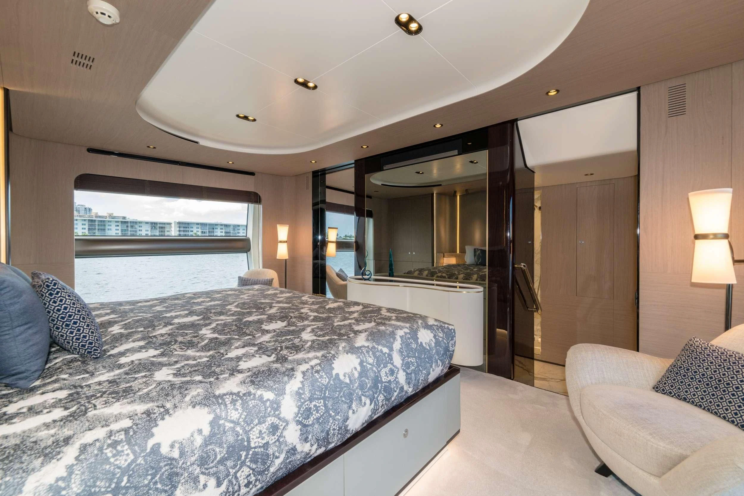 a large bedroom with a large bed aboard MAJESTIC MOMENTS Yacht for Sale