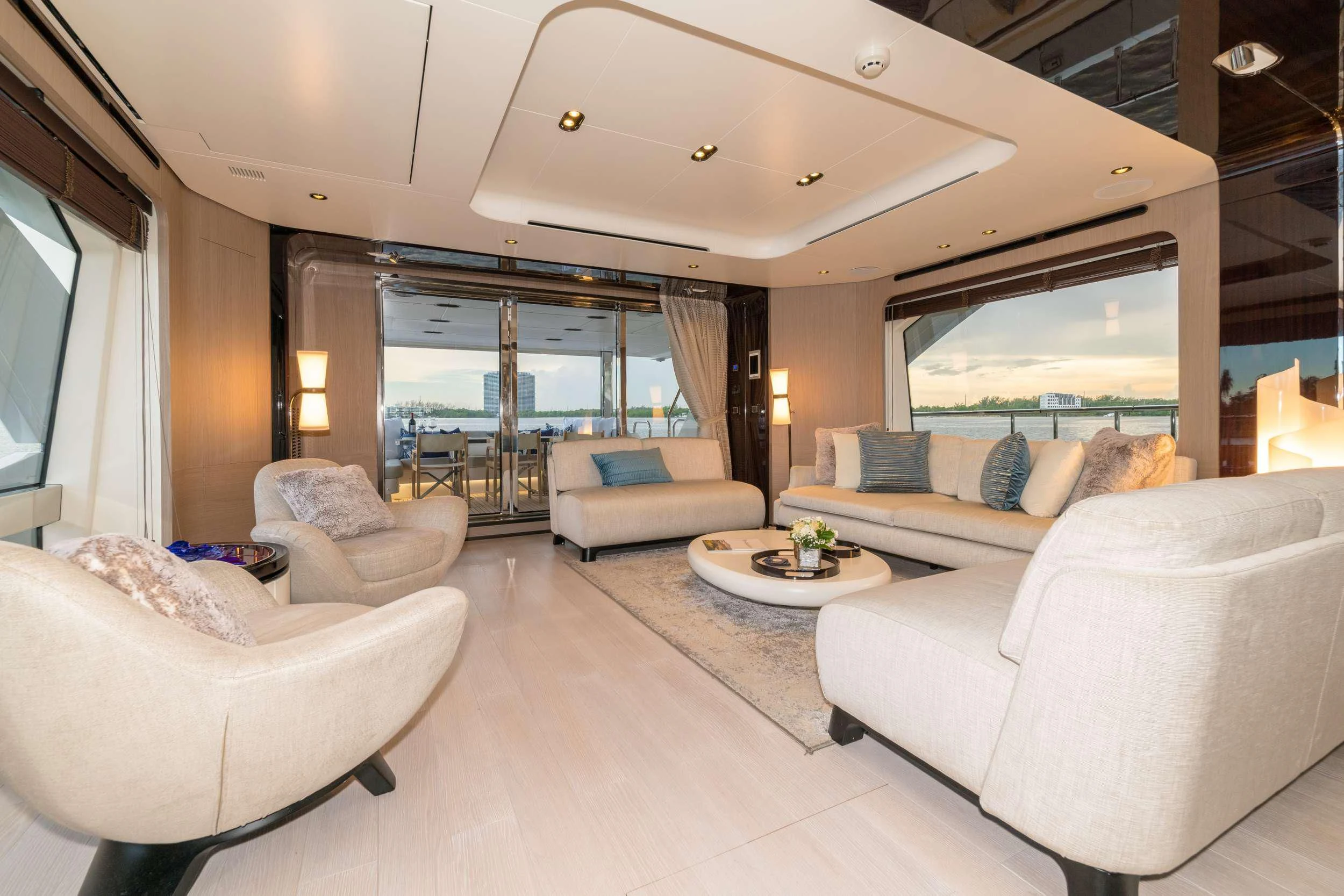 a living room with a large window aboard MAJESTIC MOMENTS Yacht for Sale