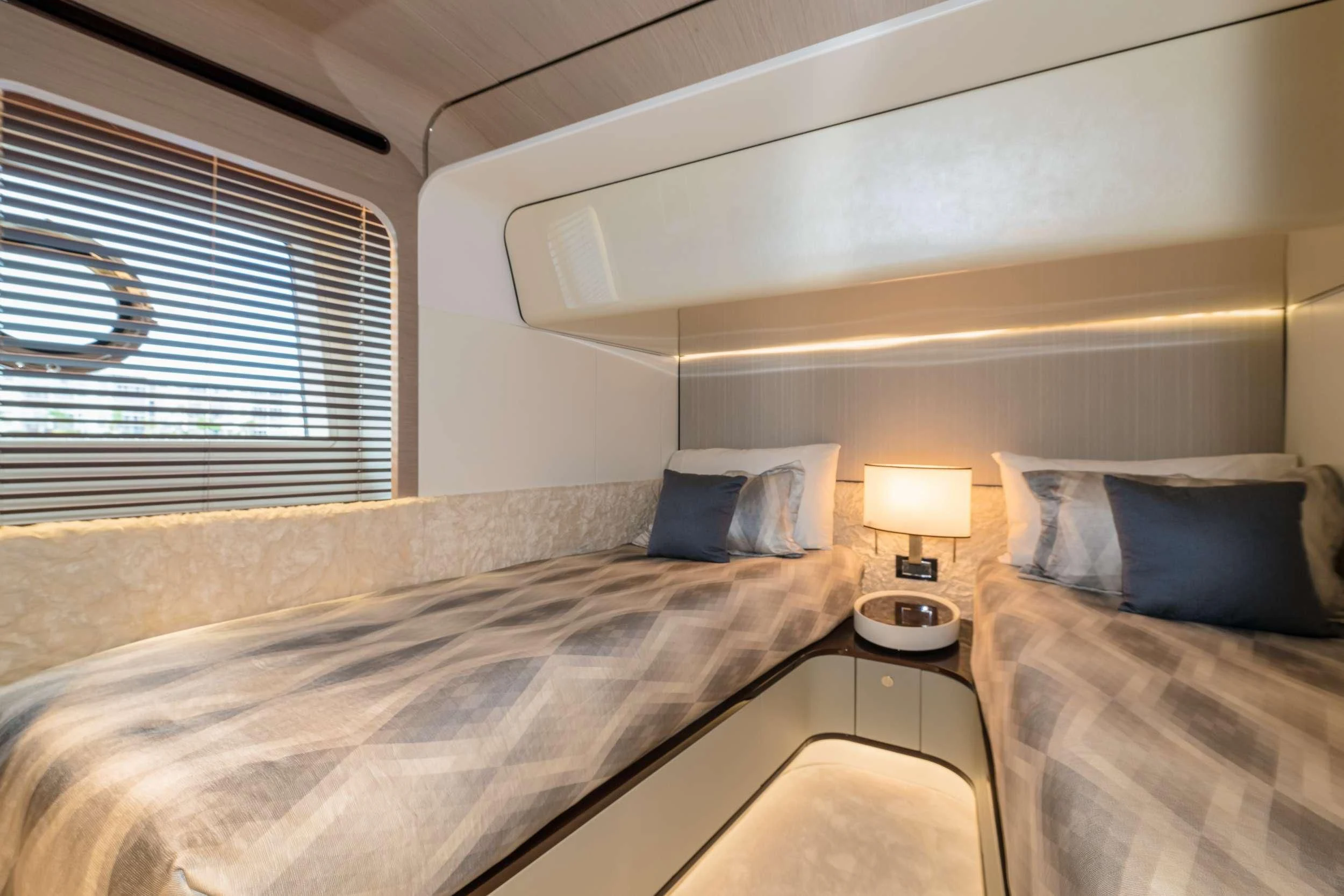 a room with two beds aboard MAJESTIC MOMENTS Yacht for Sale