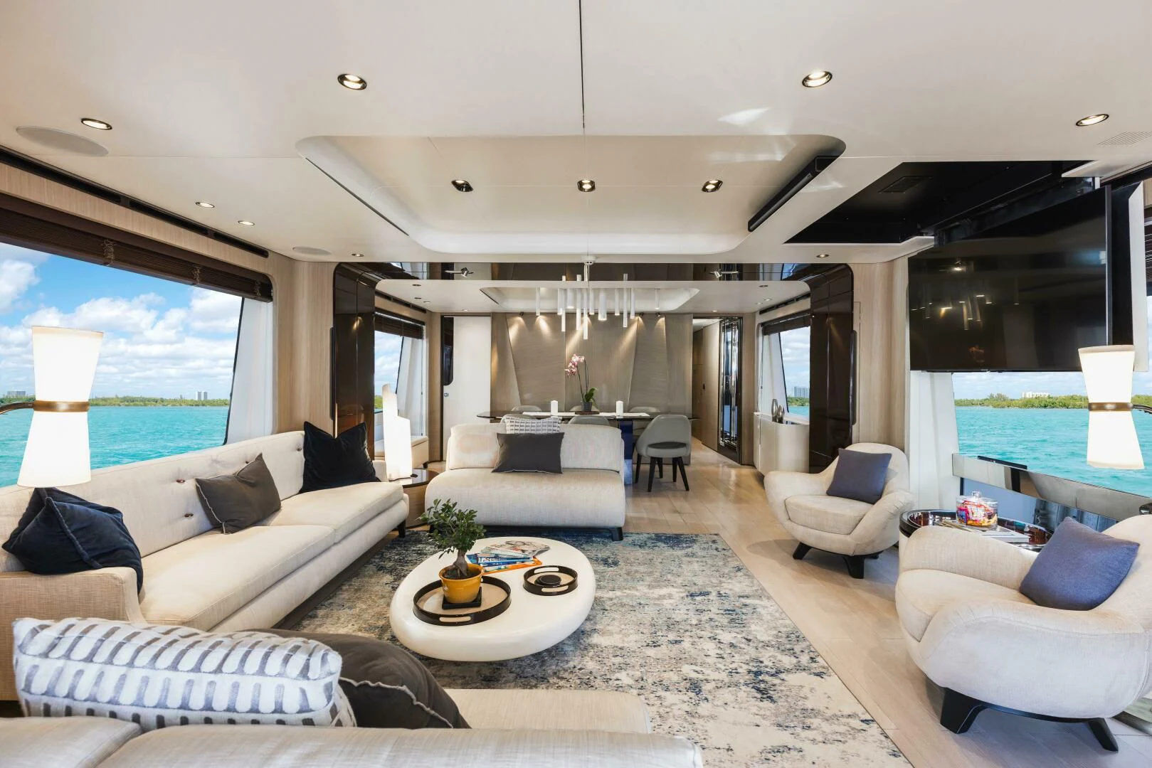 a living room with a large window aboard MAJESTIC MOMENTS Yacht for Sale