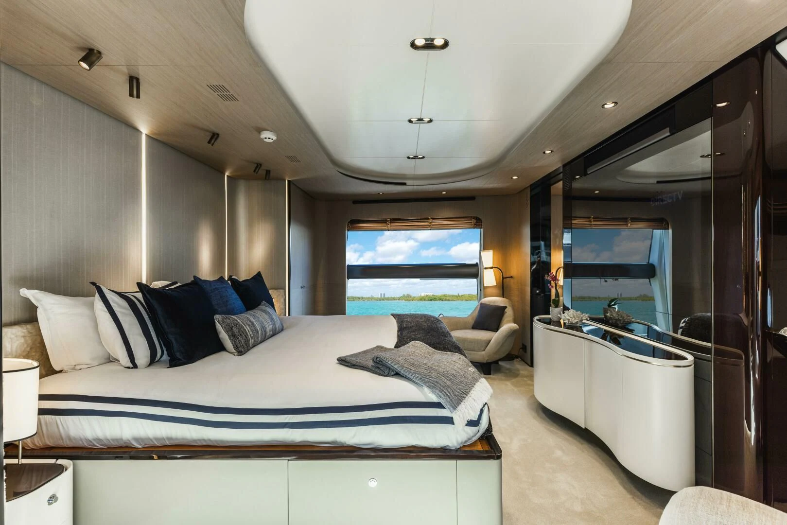 a bedroom with a large bed aboard MAJESTIC MOMENTS Yacht for Sale