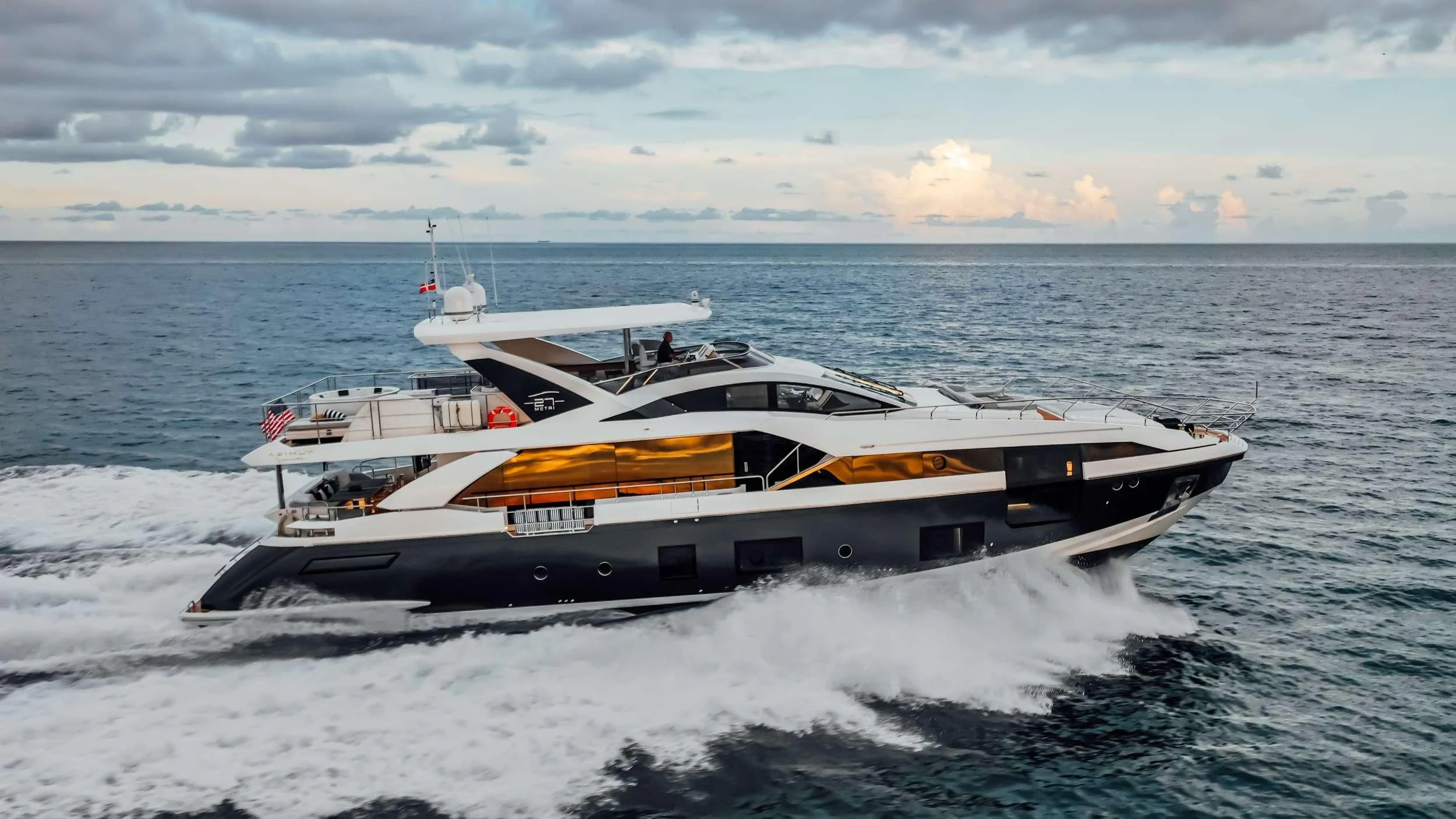 a boat on the water aboard MAJESTIC MOMENTS Yacht for Sale