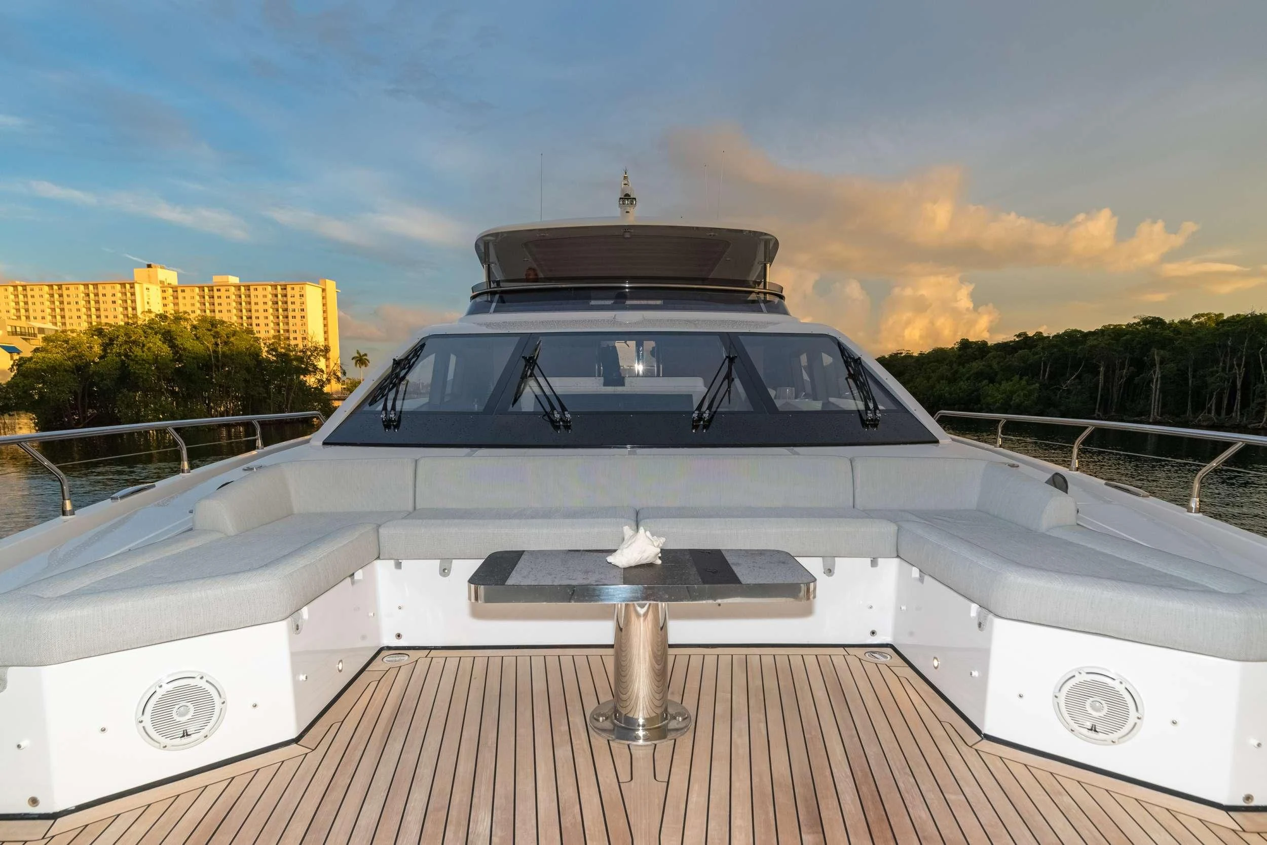 a white yacht on a dock aboard MAJESTIC MOMENTS Yacht for Sale