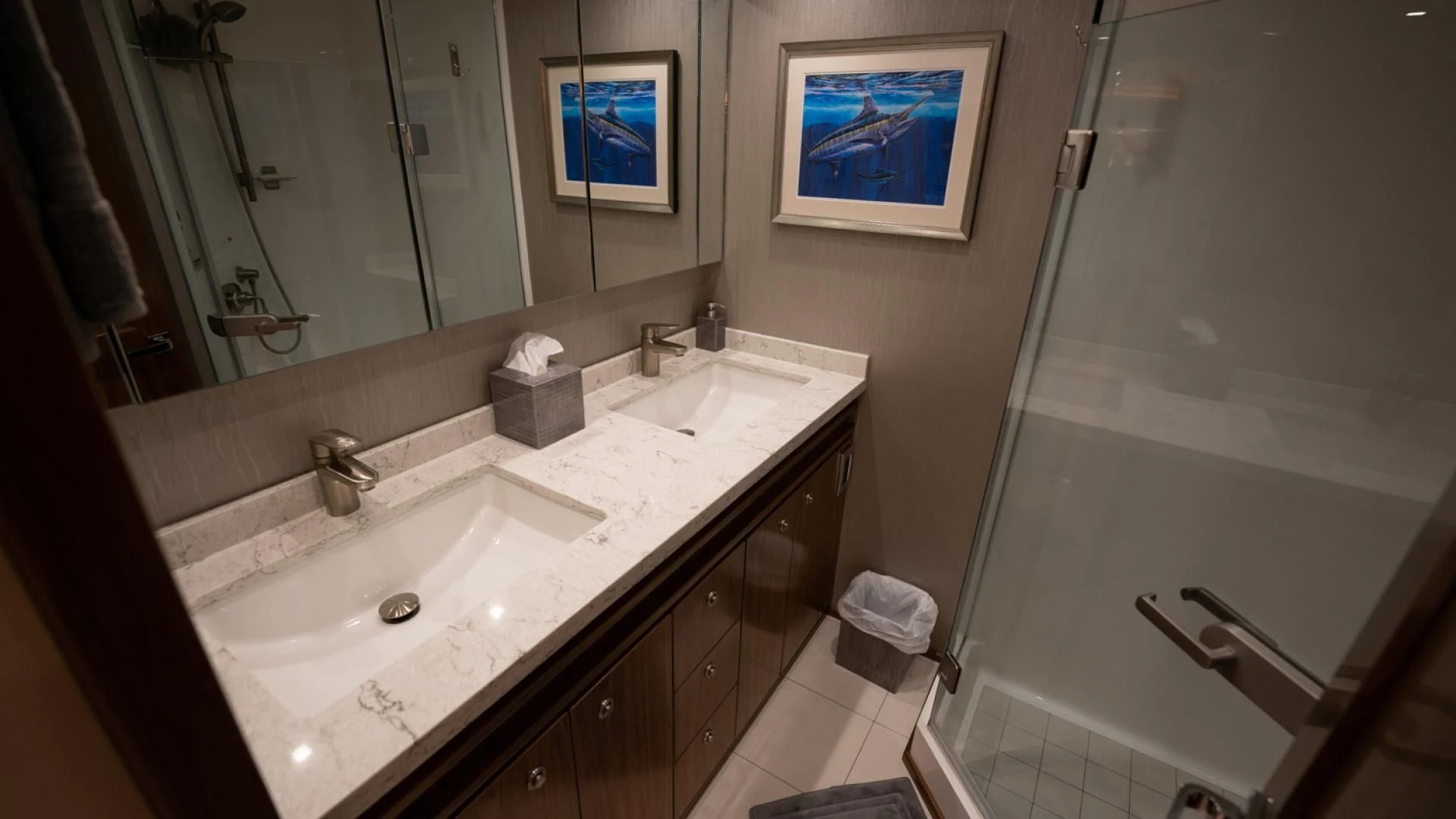 a bathroom with a sink and a mirror aboard WHY WOULDN'T WE Yacht for Sale