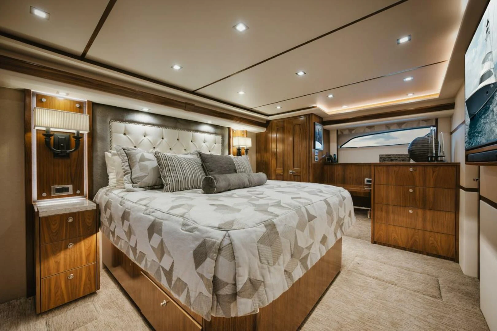 a bedroom with a large bed aboard WHY WOULDN'T WE Yacht for Sale