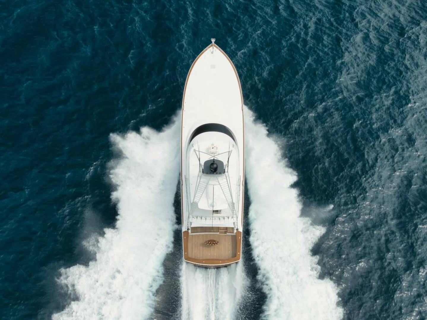 a white and gold rocket aboard WHY WOULDN'T WE Yacht for Sale