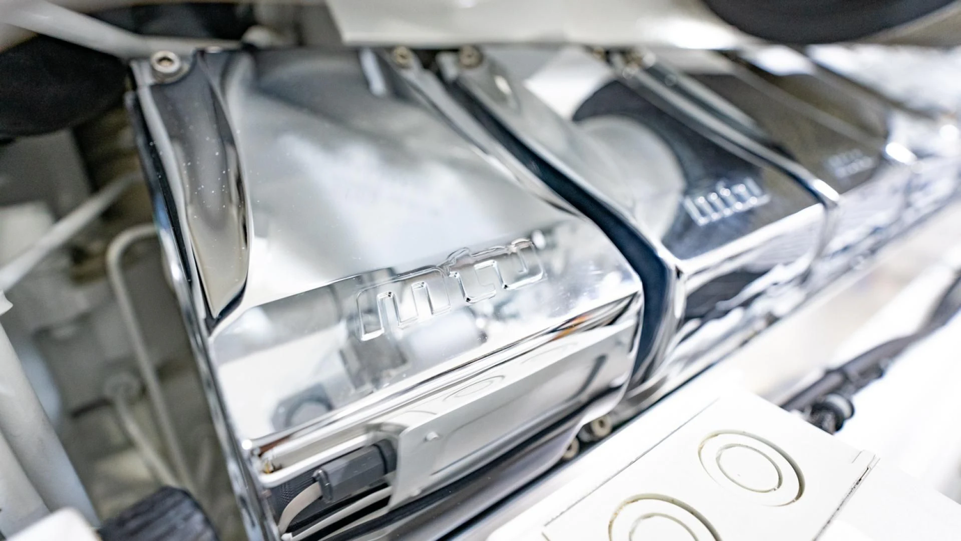 a car engine with a black frame aboard WHY WOULDN'T WE Yacht for Sale