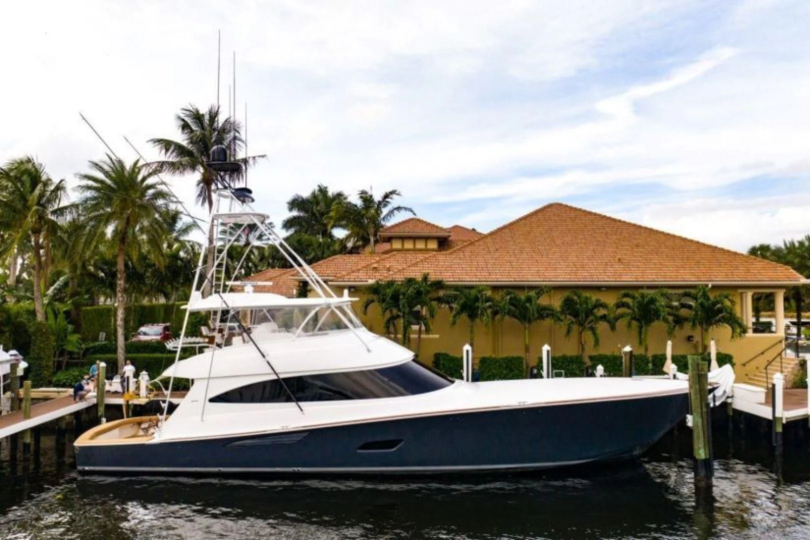 a boat docked at a pier aboard WHY WOULDN'T WE Yacht for Sale
