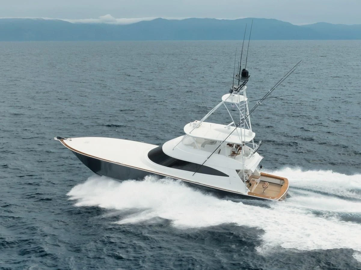 a boat on the water aboard WHY WOULDN'T WE Yacht for Sale