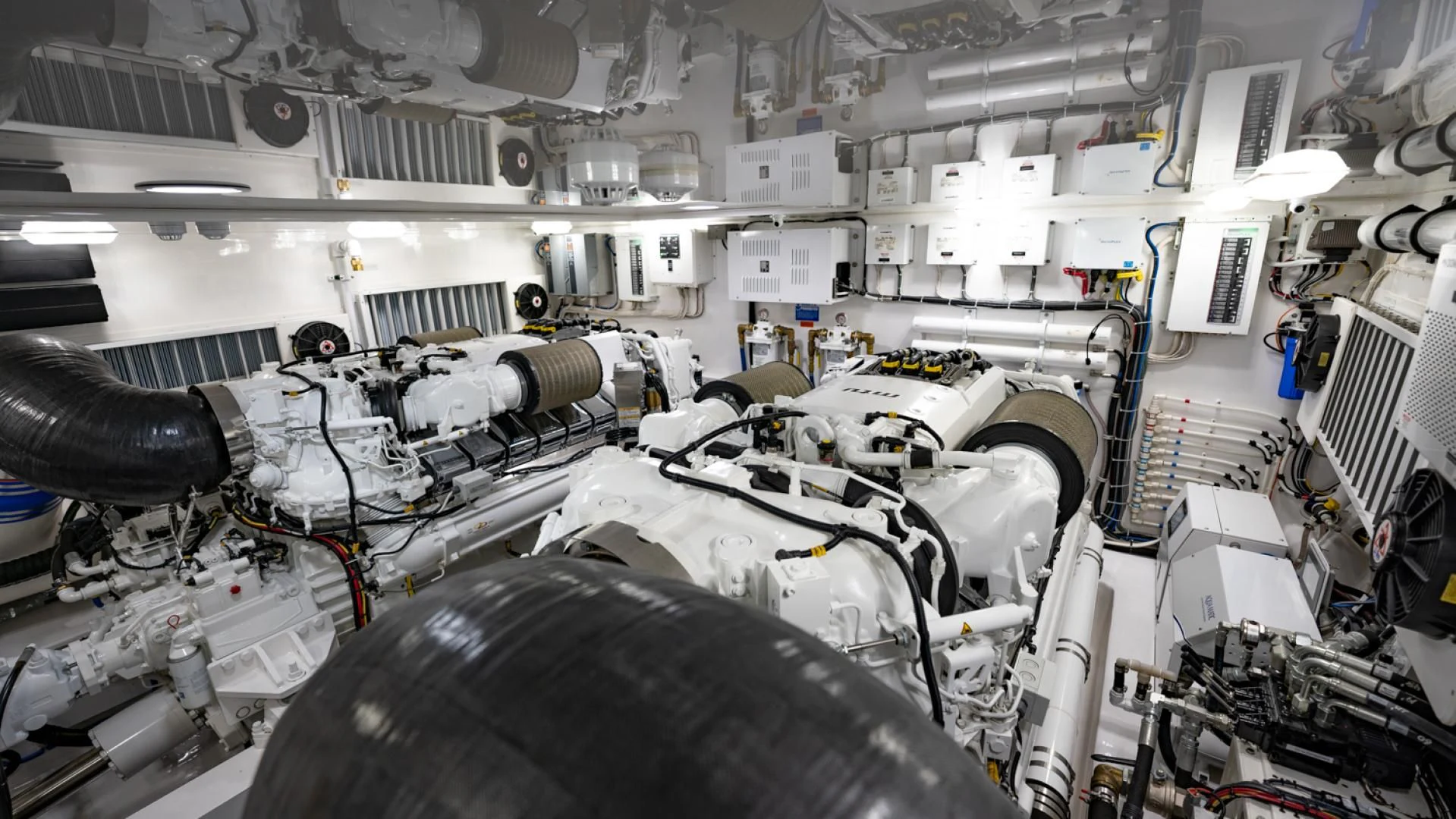 a room full of machinery aboard WHY WOULDN'T WE Yacht for Sale