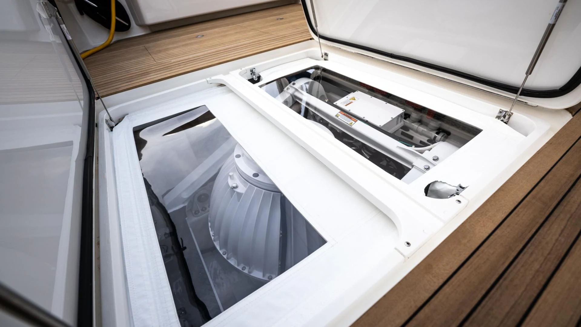 a white stove with a vent aboard WHY WOULDN'T WE Yacht for Sale