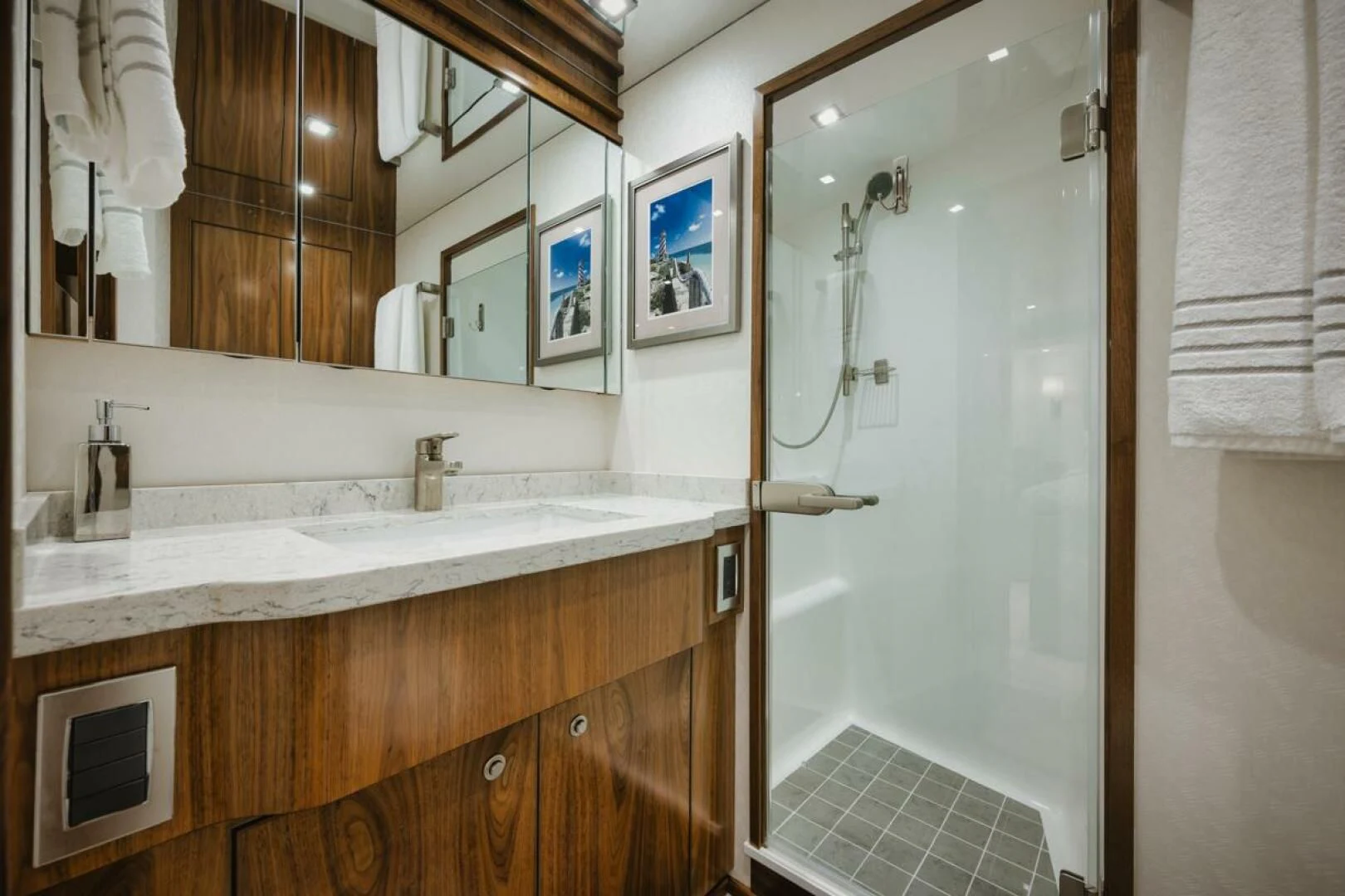a bathroom with a shower and sink aboard WHY WOULDN'T WE Yacht for Sale