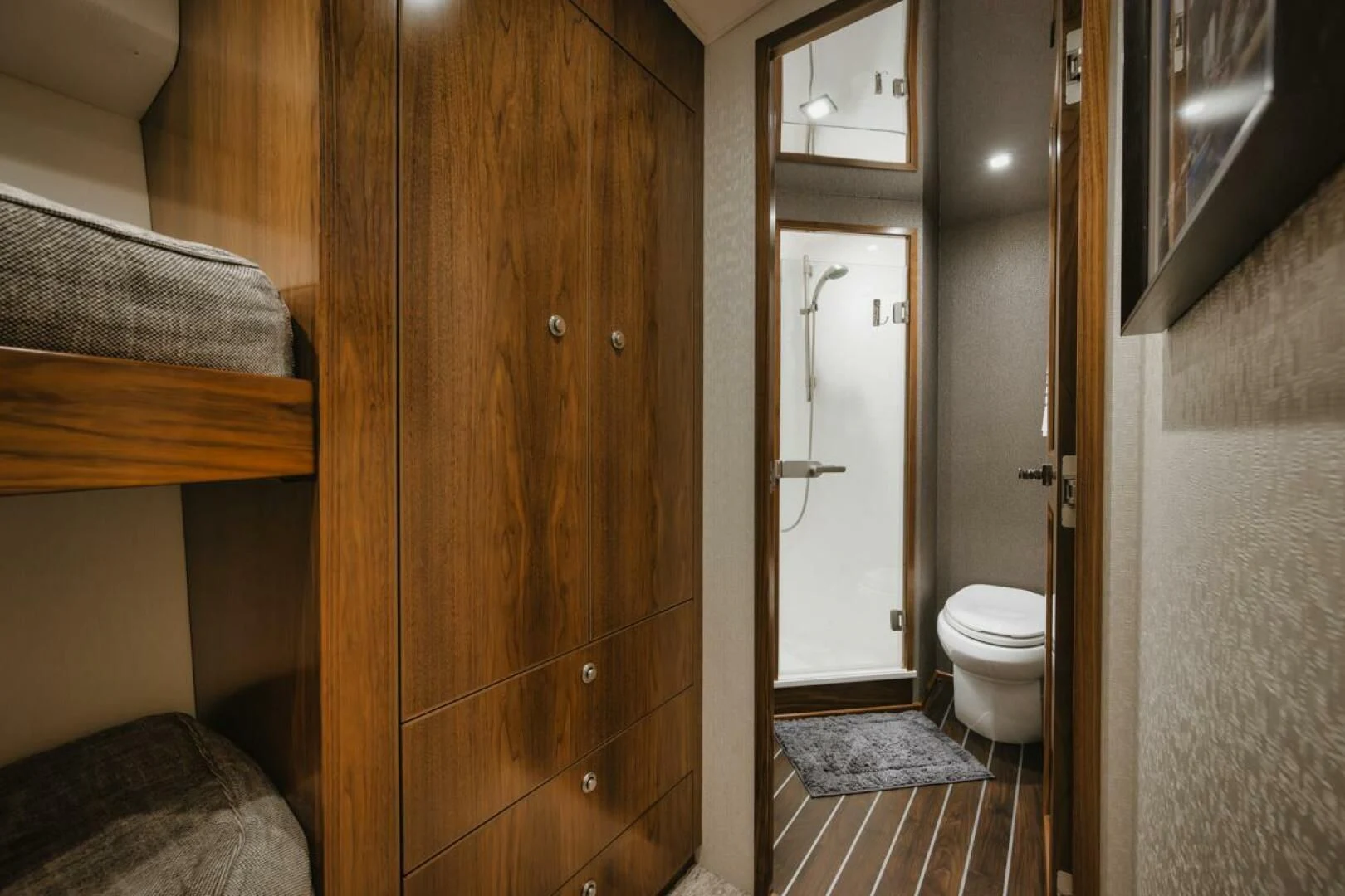 a bathroom with a wood cabinet aboard WHY WOULDN'T WE Yacht for Sale