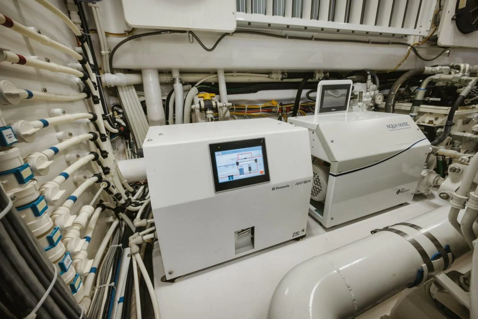 a machine in a room aboard WHY WOULDN'T WE Yacht for Sale