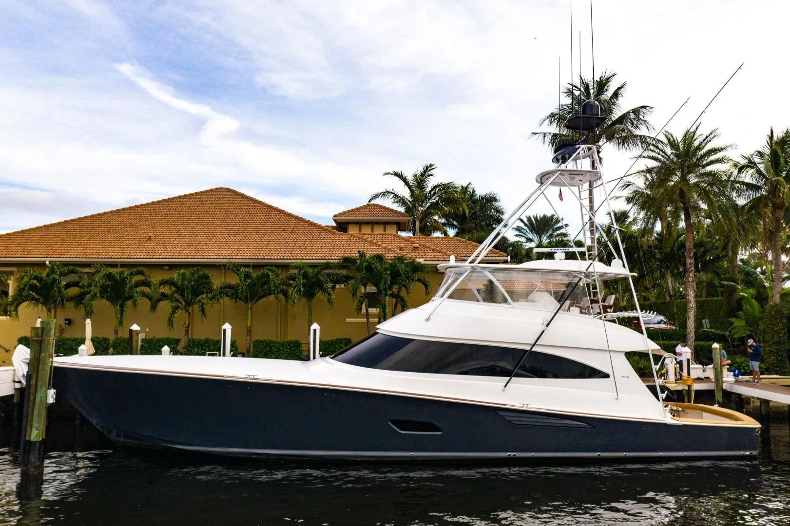 a boat docked at a pier aboard WHY WOULDN'T WE Yacht for Sale