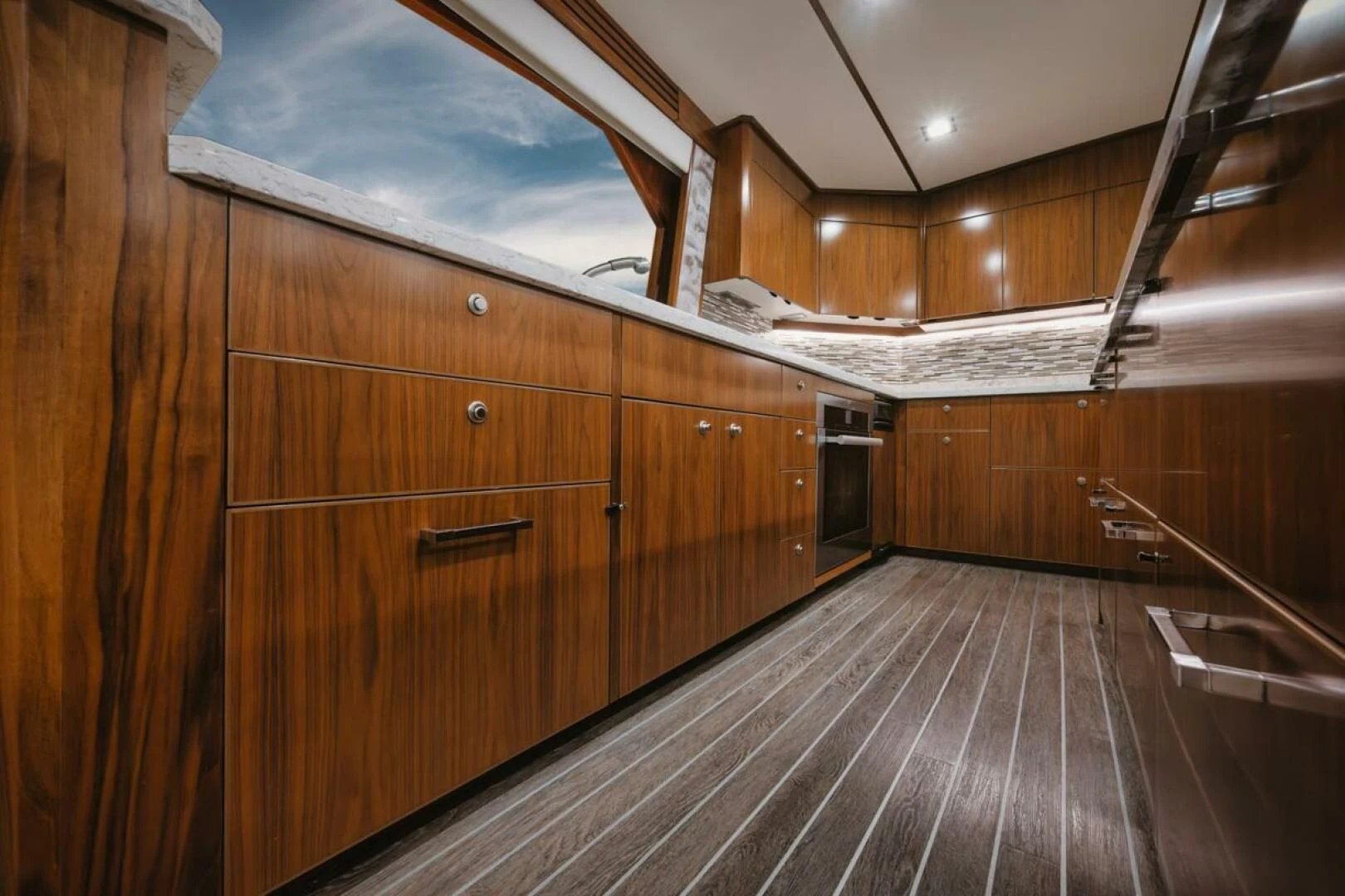 a wooden room with wooden cabinets aboard WHY WOULDN'T WE Yacht for Sale