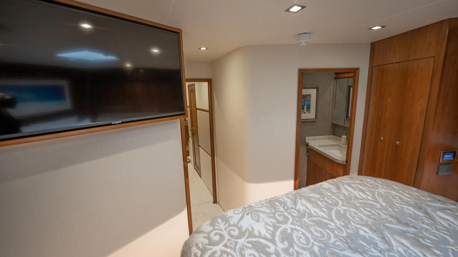 a bedroom with a bed aboard WHY WOULDN'T WE Yacht for Sale