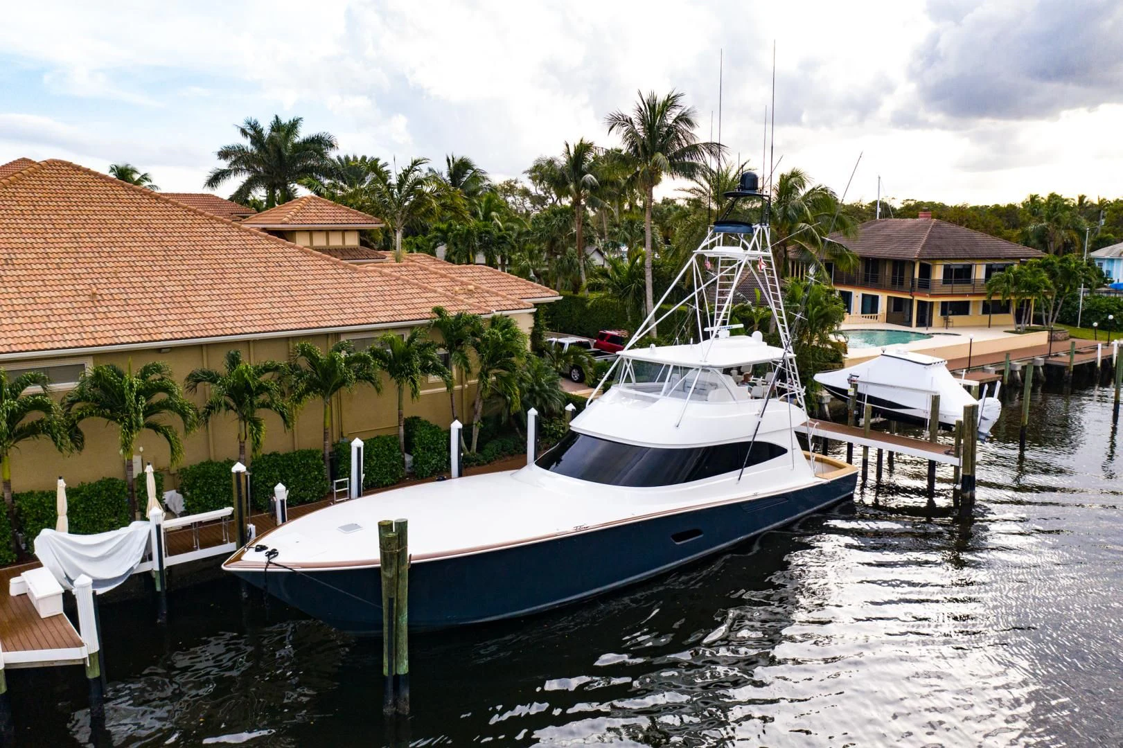 a boat docked at a pier aboard WHY WOULDN'T WE Yacht for Sale
