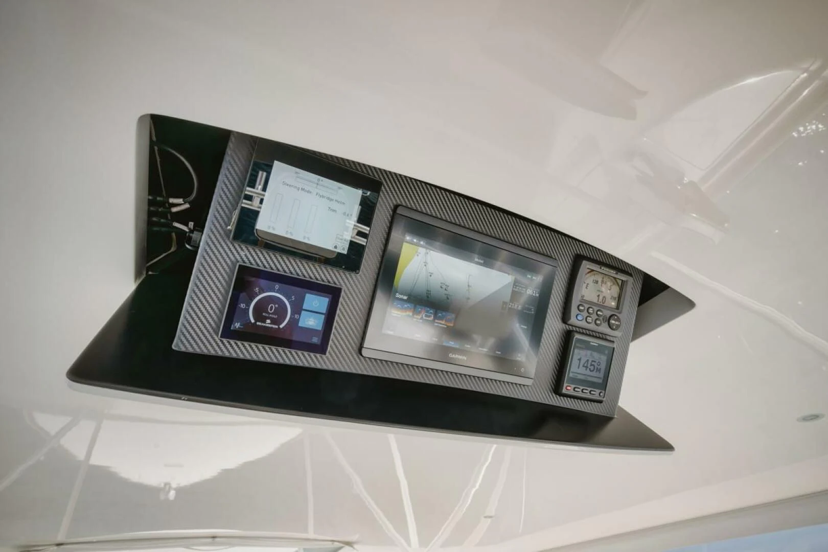 a laptop computer on a white surface aboard WHY WOULDN'T WE Yacht for Sale