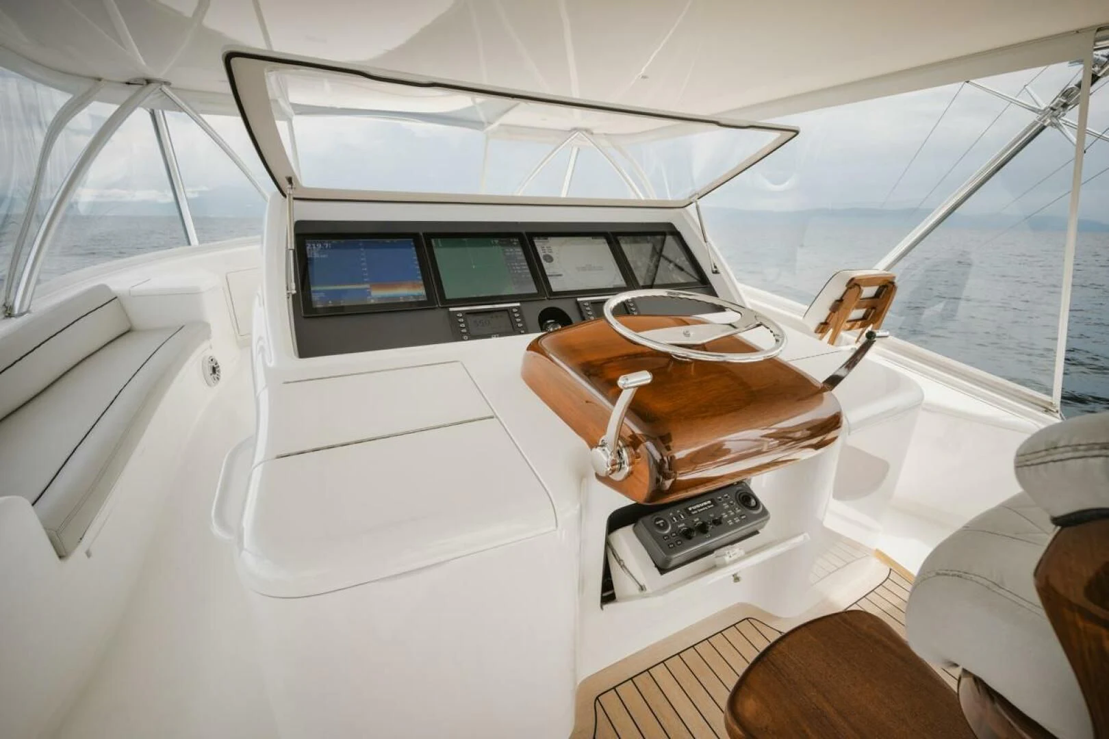 inside of a white car aboard WHY WOULDN'T WE Yacht for Sale