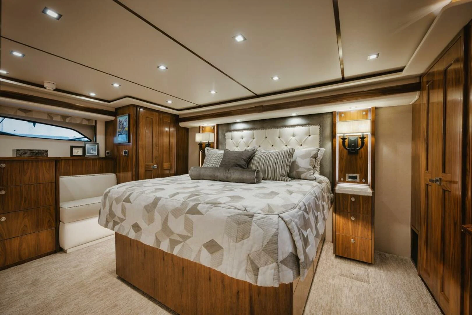 a large bedroom with a large bed aboard WHY WOULDN'T WE Yacht for Sale
